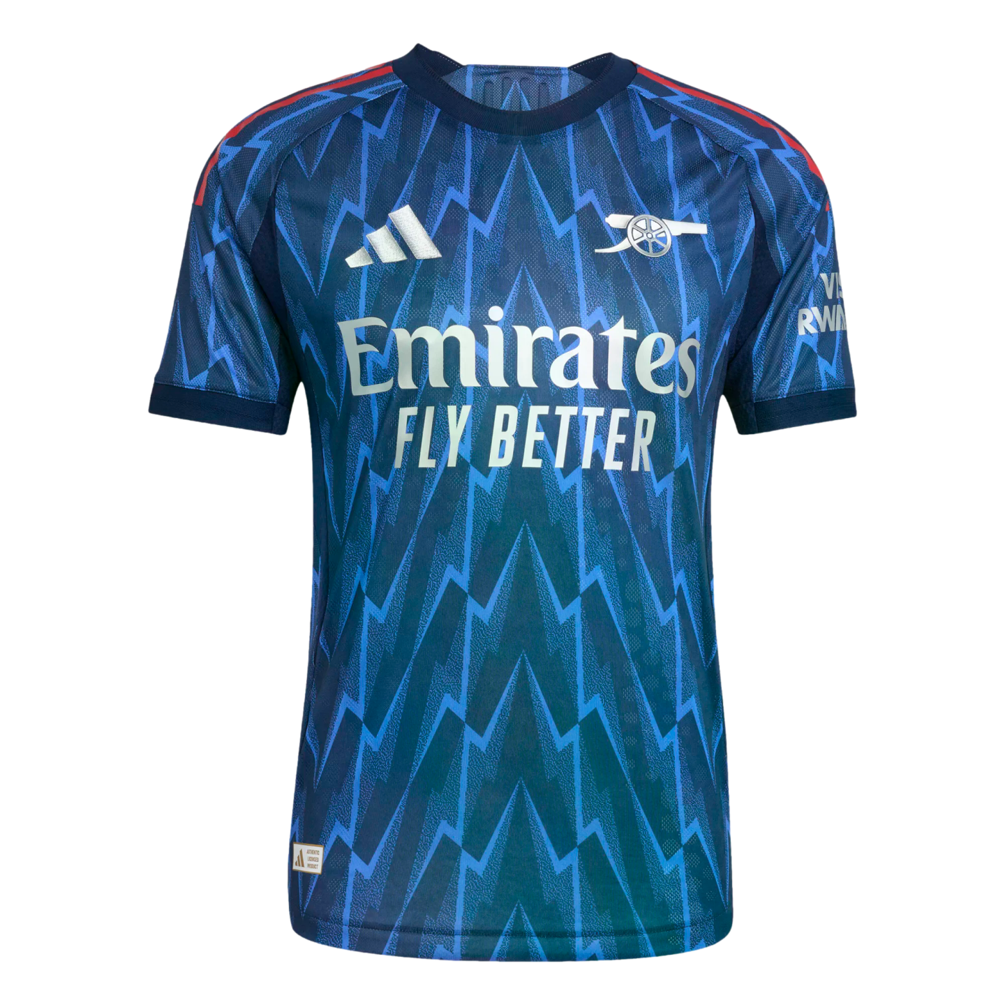 A blue Arsenal football jersey featuring a dark and light blue zigzag pattern, white Adidas and Arsenal logos, and a white "Emirates Fly Better" sponsor logo on the chest.