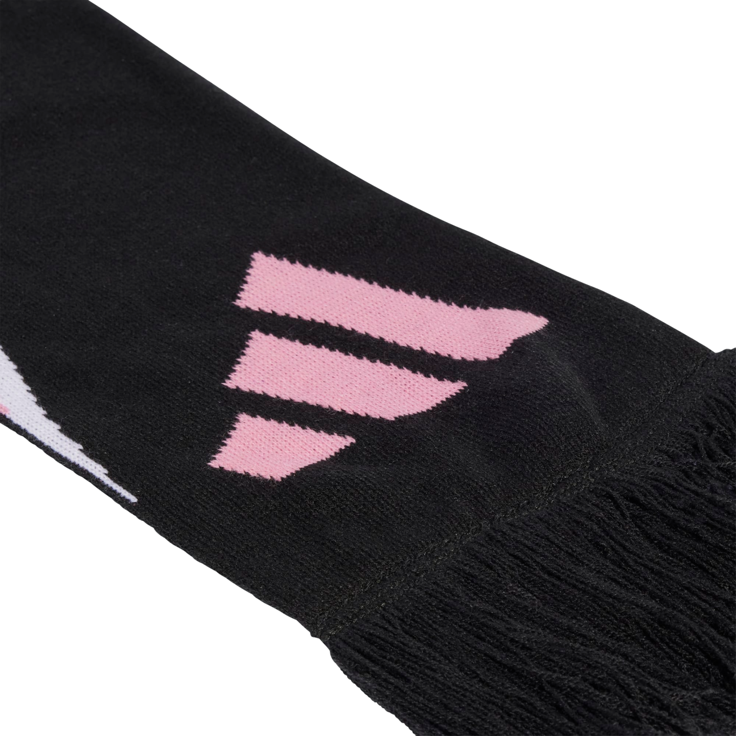 Close-up of a black knit scarf featuring a pink three-stripe logo and black fringe at the end.