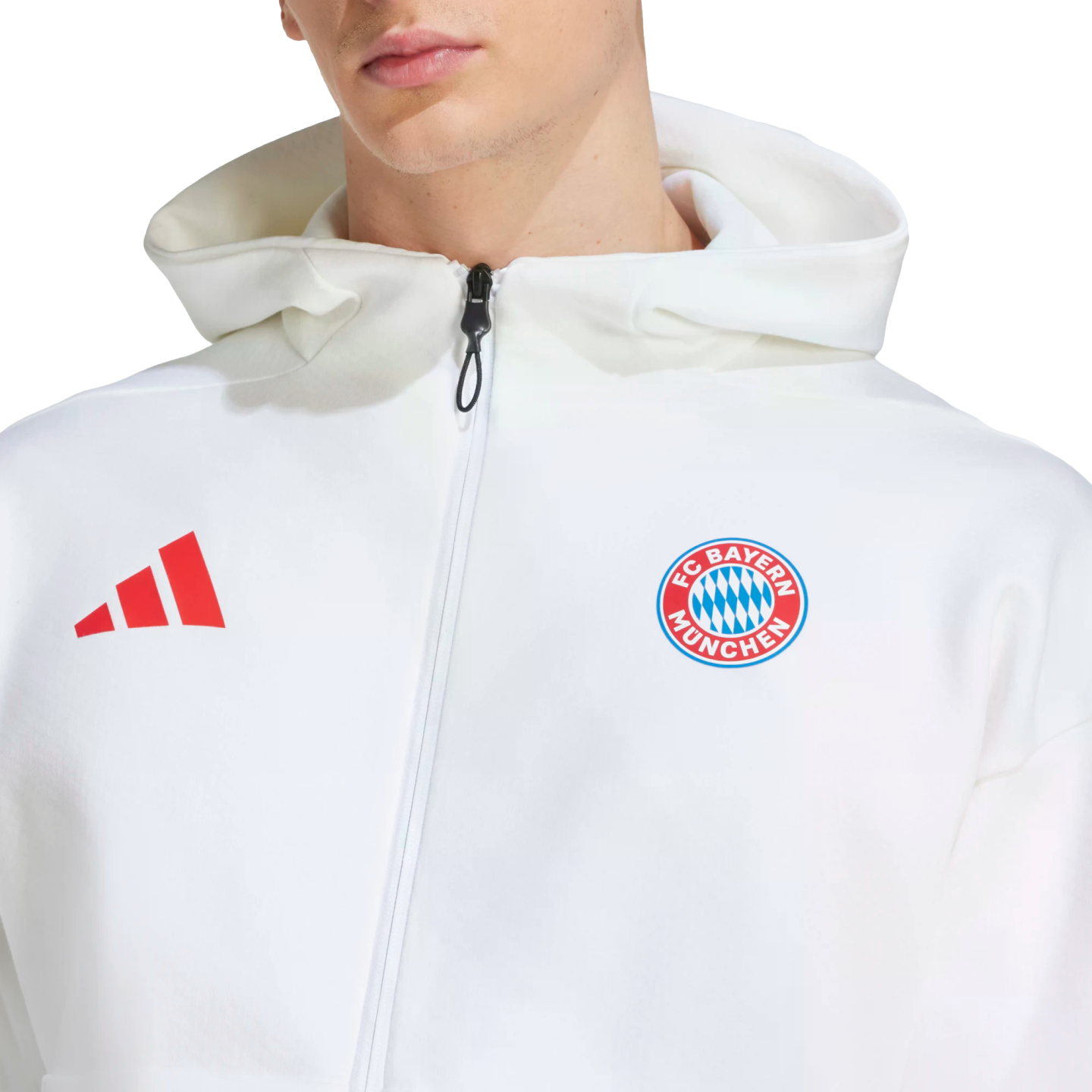 A white Adidas FC Bayern München zip-up hoodie featuring a red brand logo and the team's crest.