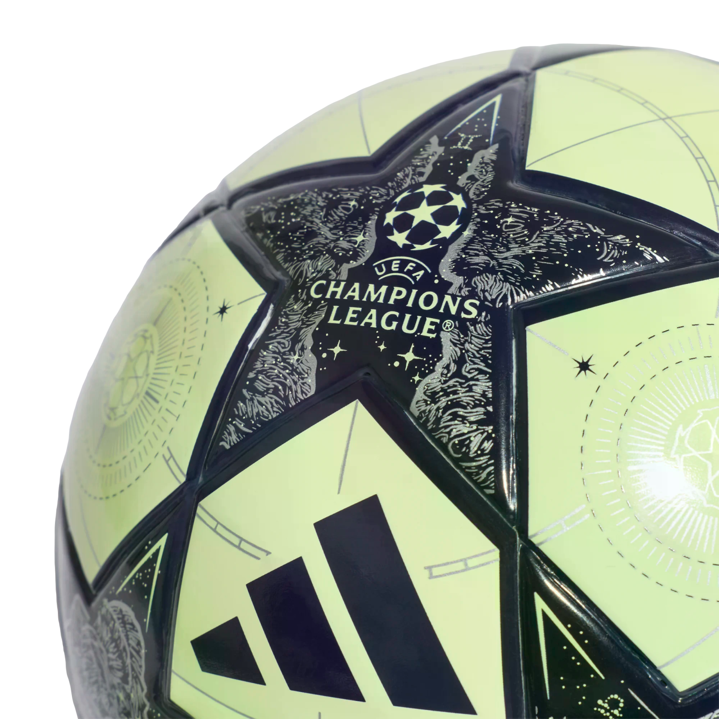 Close-up of a light green and dark blue Adidas UEFA Champions League soccer ball featuring the competition logo and intricate celestial patterns on its star-shaped panels.