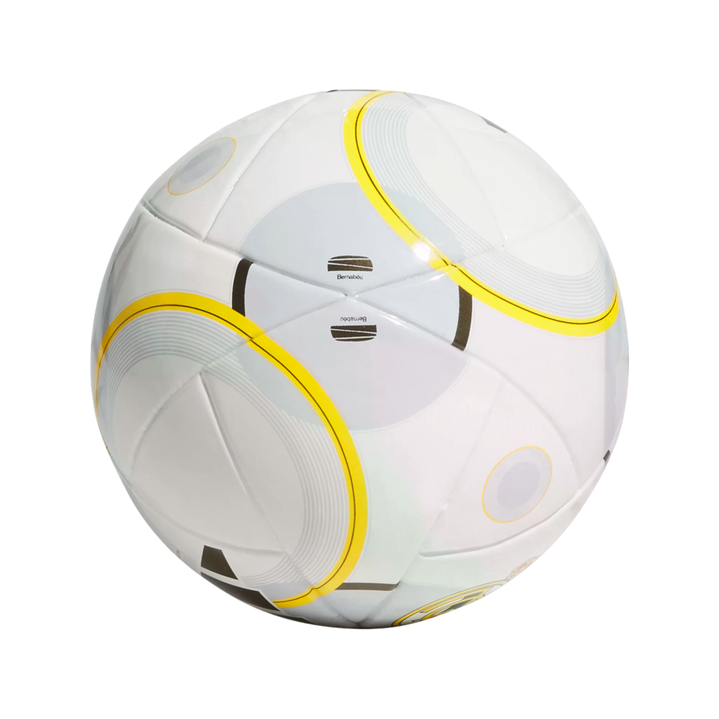 A white soccer ball with yellow and grey curved designs and the text 'Bernabéu' on its surface, isolated on a white background.