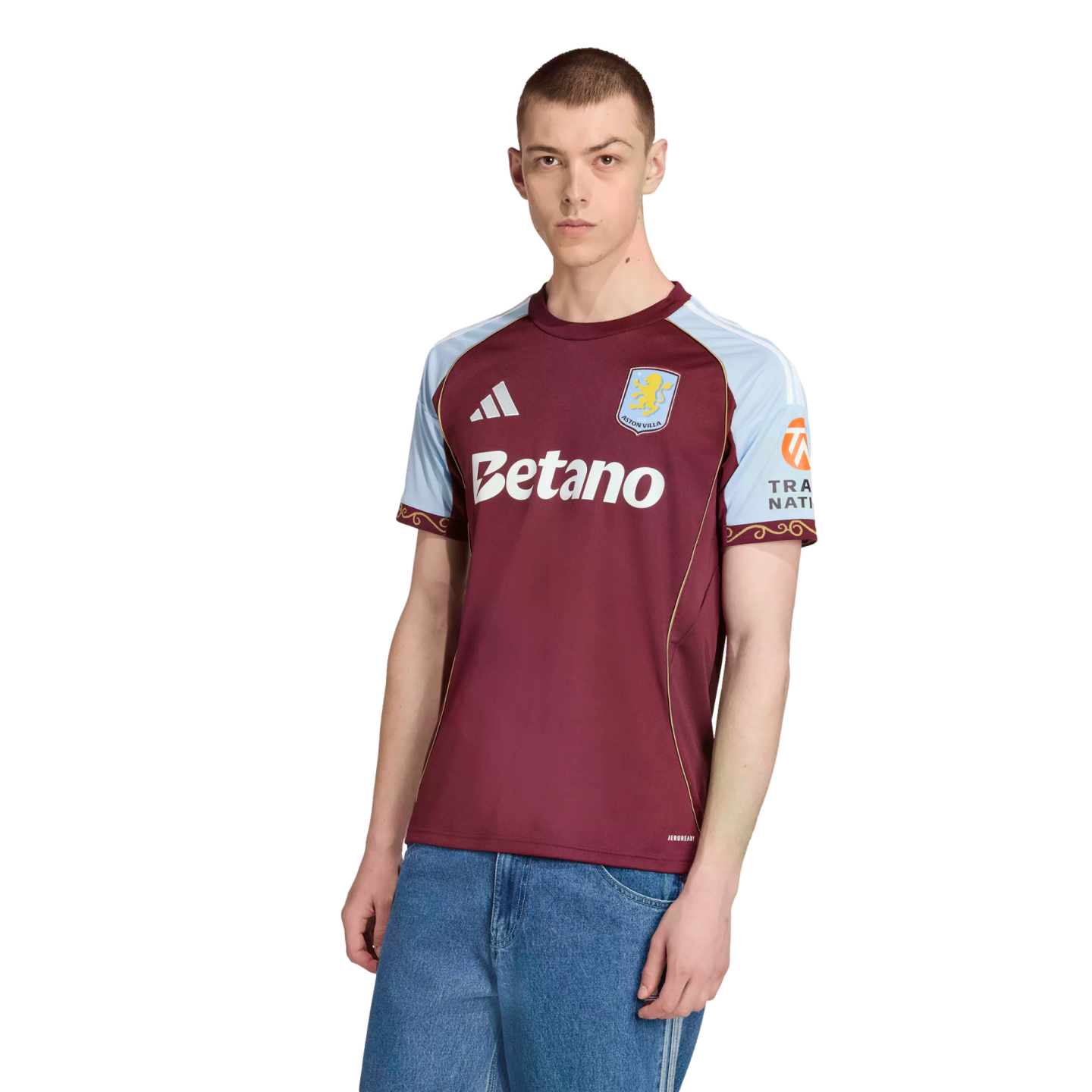 Male model wearing the claret and blue 2024-25 Aston Villa home kit by Adidas with Betano sponsor logo against a black background.