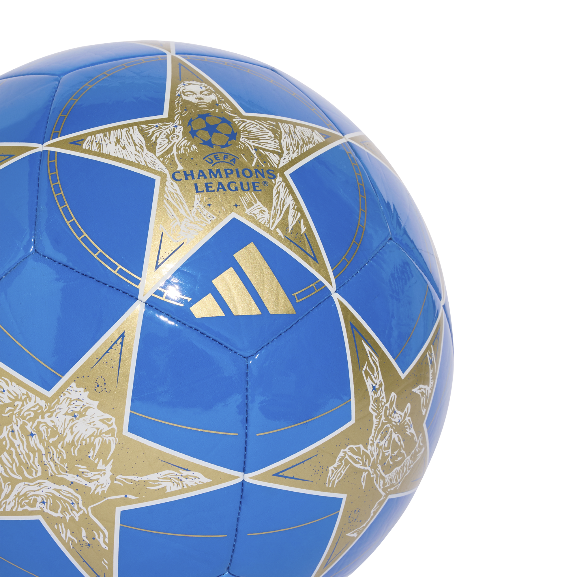 Blue Adidas UEFA Champions League soccer ball featuring white and gold star panels with detailed illustrations of a face, a lion, and a crab.