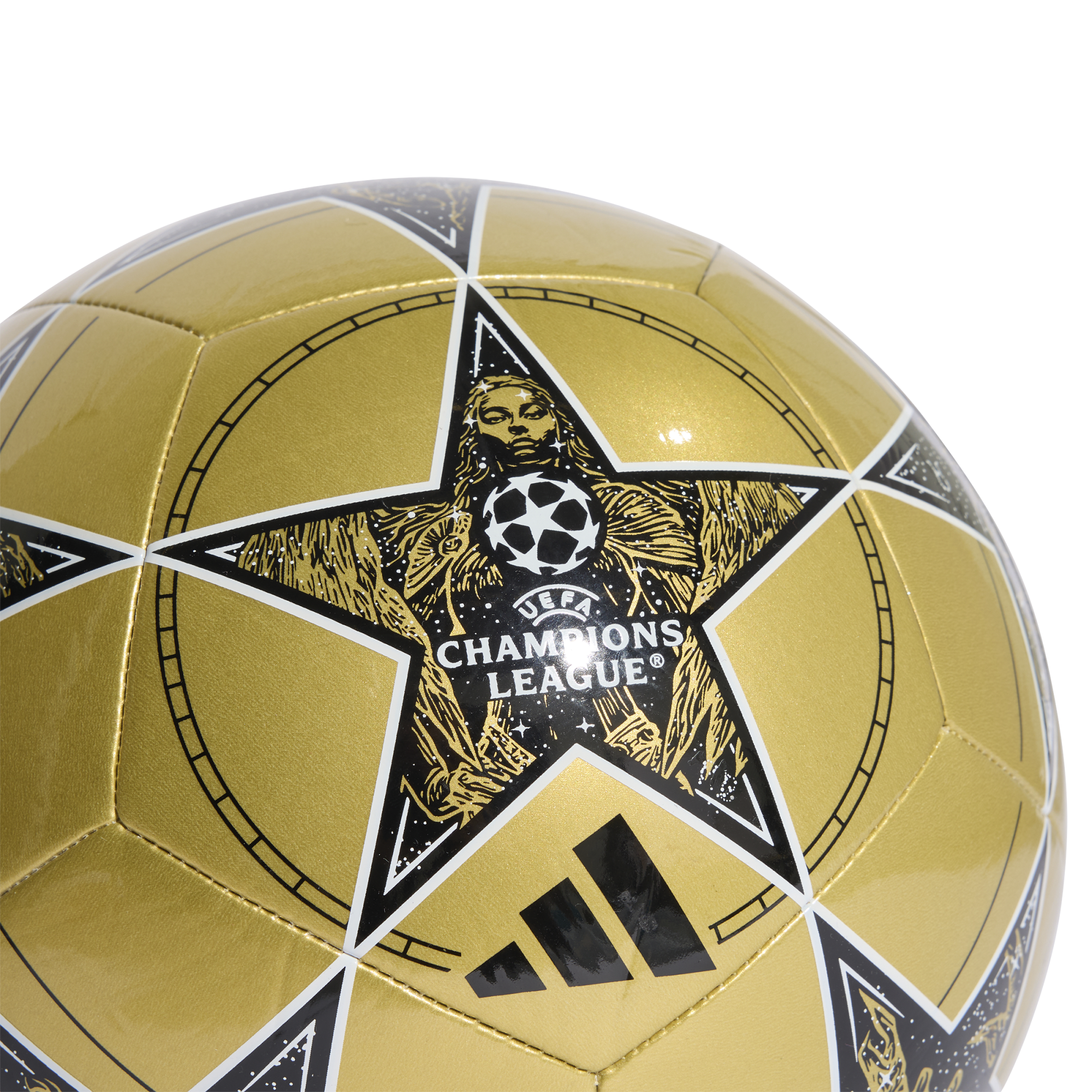 Gold soccer ball with black star panels. The central star features the UEFA Champions League logo over a woman's illustration. An Adidas logo is visible below.