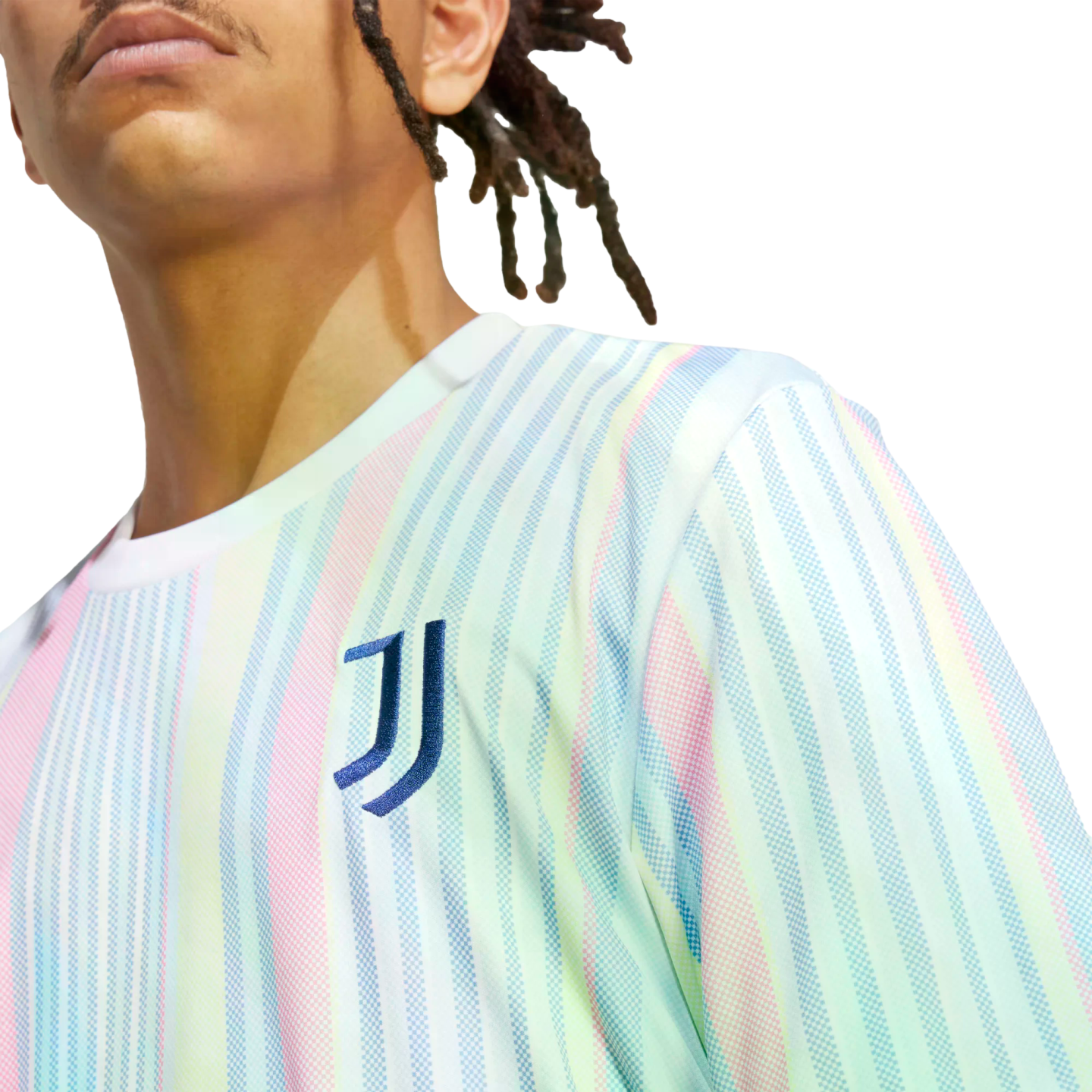 A person wears a Juventus soccer jersey featuring pastel-colored vertical stripes and the team's "J" logo on the chest.