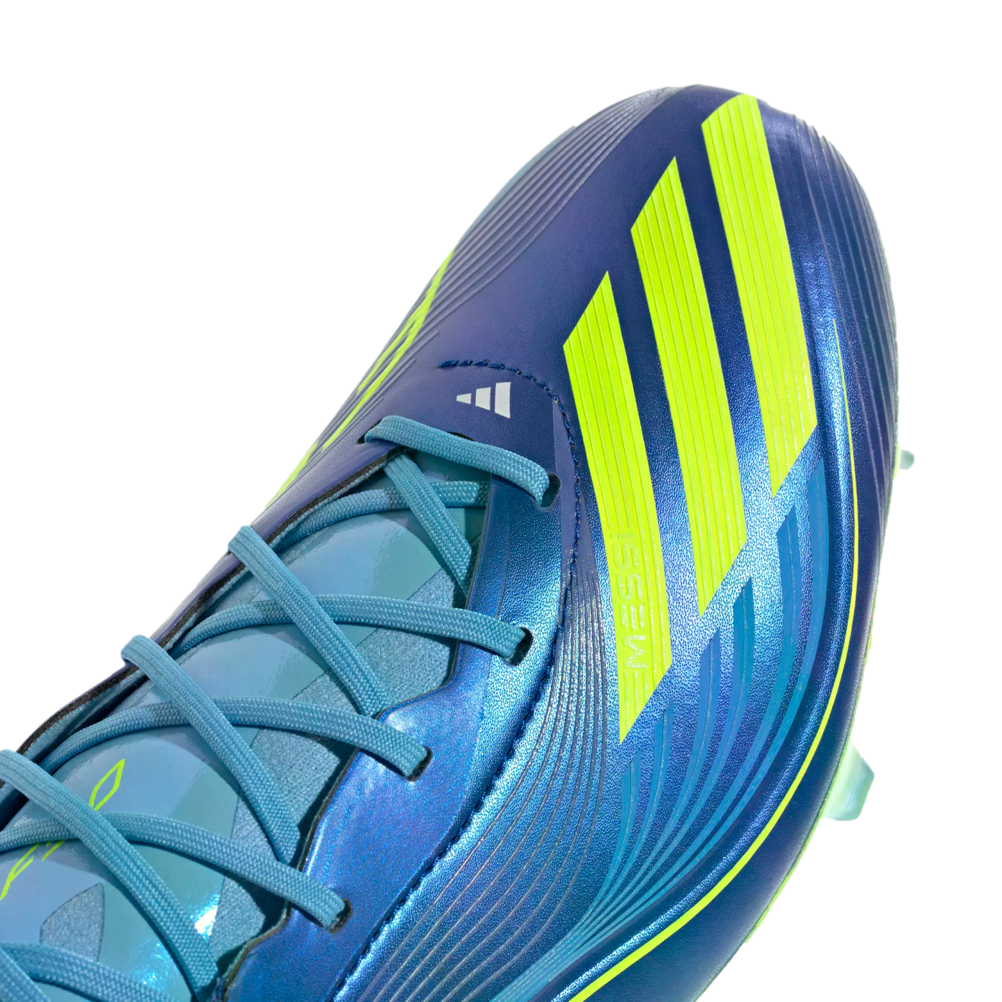 Close-up of a metallic blue Adidas soccer cleat with vibrant yellow stripes, light blue laces, and Messi branding.