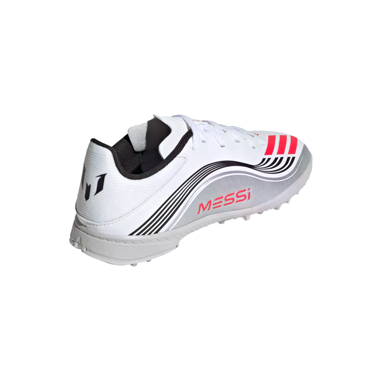 White Adidas Messi soccer turf shoe featuring red "MESSI" branding, black wavy stripes, and a grey studded sole, viewed from a rear three-quarter angle.