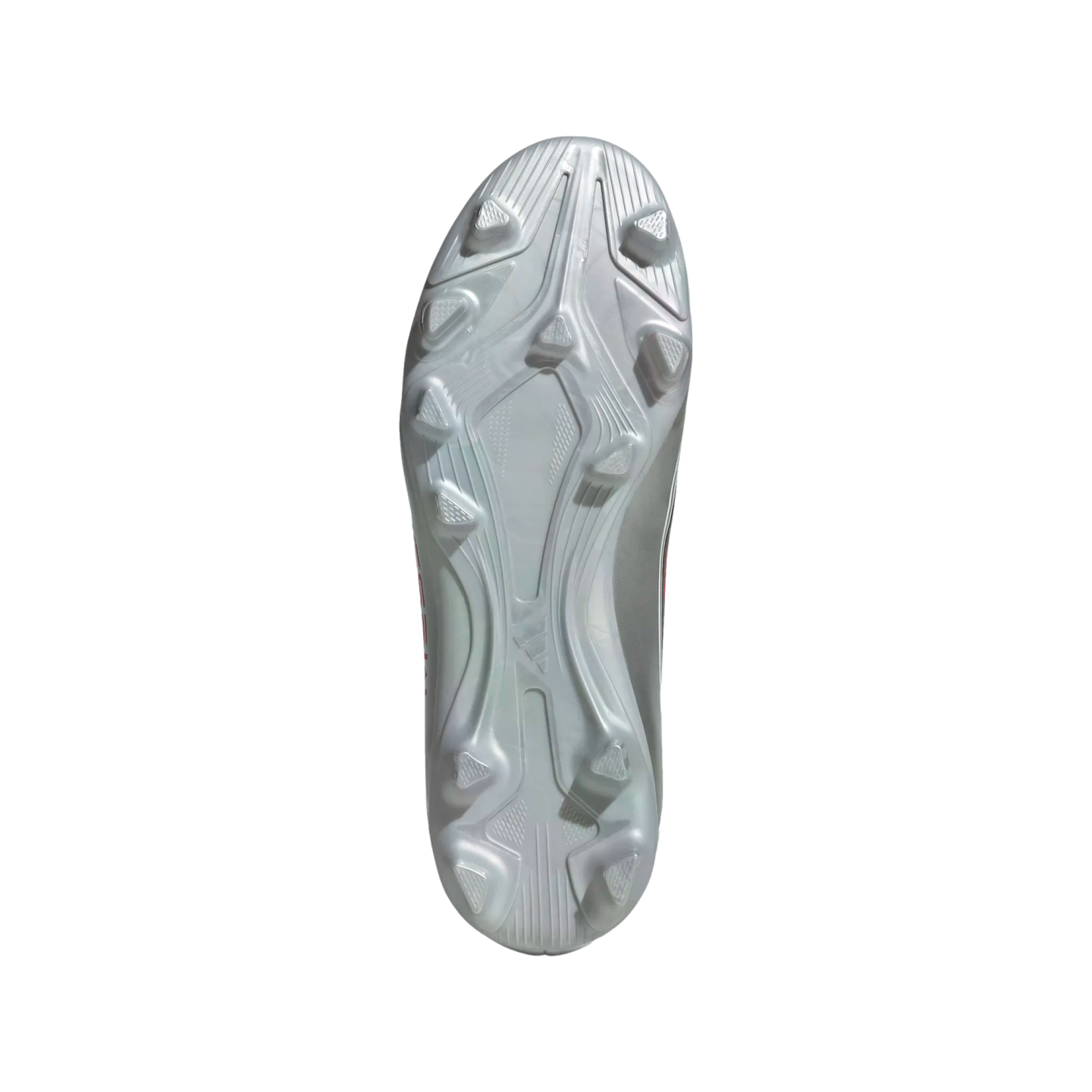 Bottom view of a metallic silver soccer cleat's outsole, highlighting its angular molded studs and sleek, contoured design.