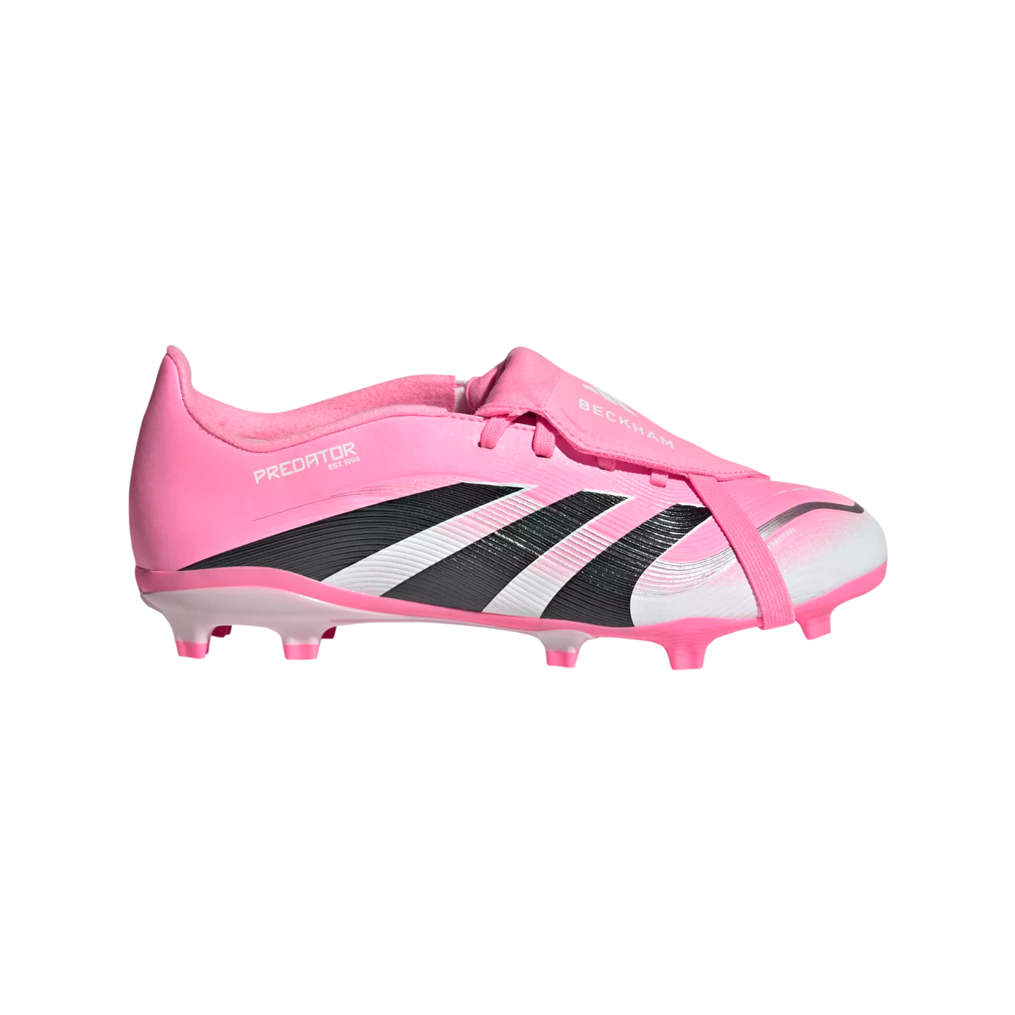 Side view of a bright pink Adidas Predator soccer cleat with black stripes and "BECKHAM" printed on the fold-over tongue, set against a black background.
