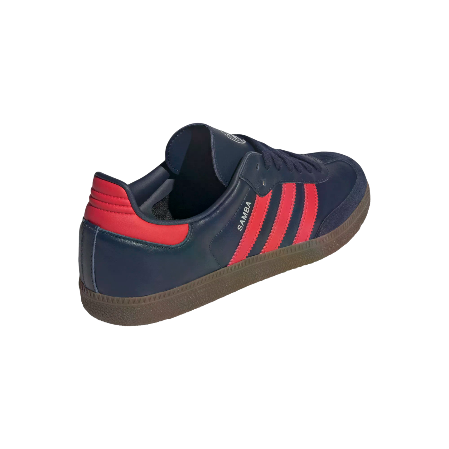 Rear-side view of a navy blue Adidas Samba sneaker with three red stripes, a red heel tab, and a brown gum rubber sole.