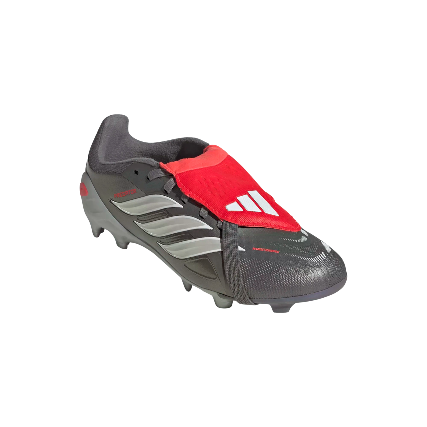 Grey Adidas Predator soccer cleat featuring silver stripes, a red fold-over tongue with a white logo, and a black elastic strap under the sole.