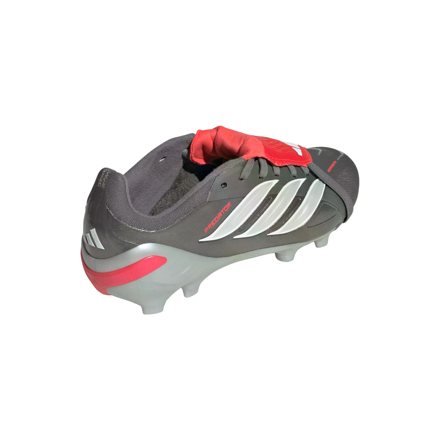 A dark grey Adidas Predator soccer cleat with white stripes and a red fold-over tongue, shown from a rear angle on a black background.
