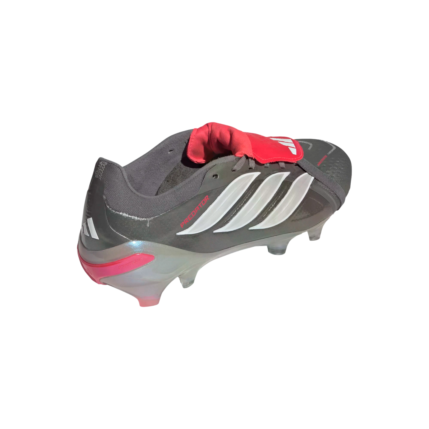 Gray Adidas Predator soccer cleat with white stripes, a prominent red fold-over tongue, and translucent studs, isolated on black.