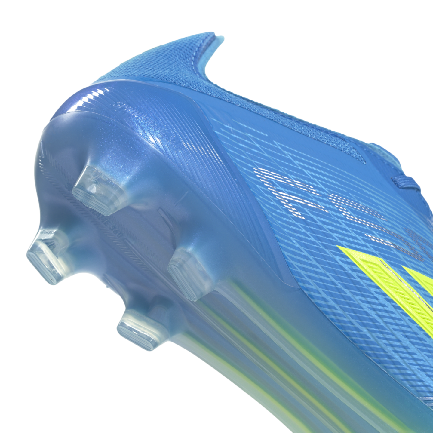 A close-up shot of the heel and translucent blue soleplate of a bright blue soccer cleat against a solid black background. The semi-transparent soleplate features clear integrated studs and embossed "SPEEDFRAME 360" text, with partial yellow accents visib