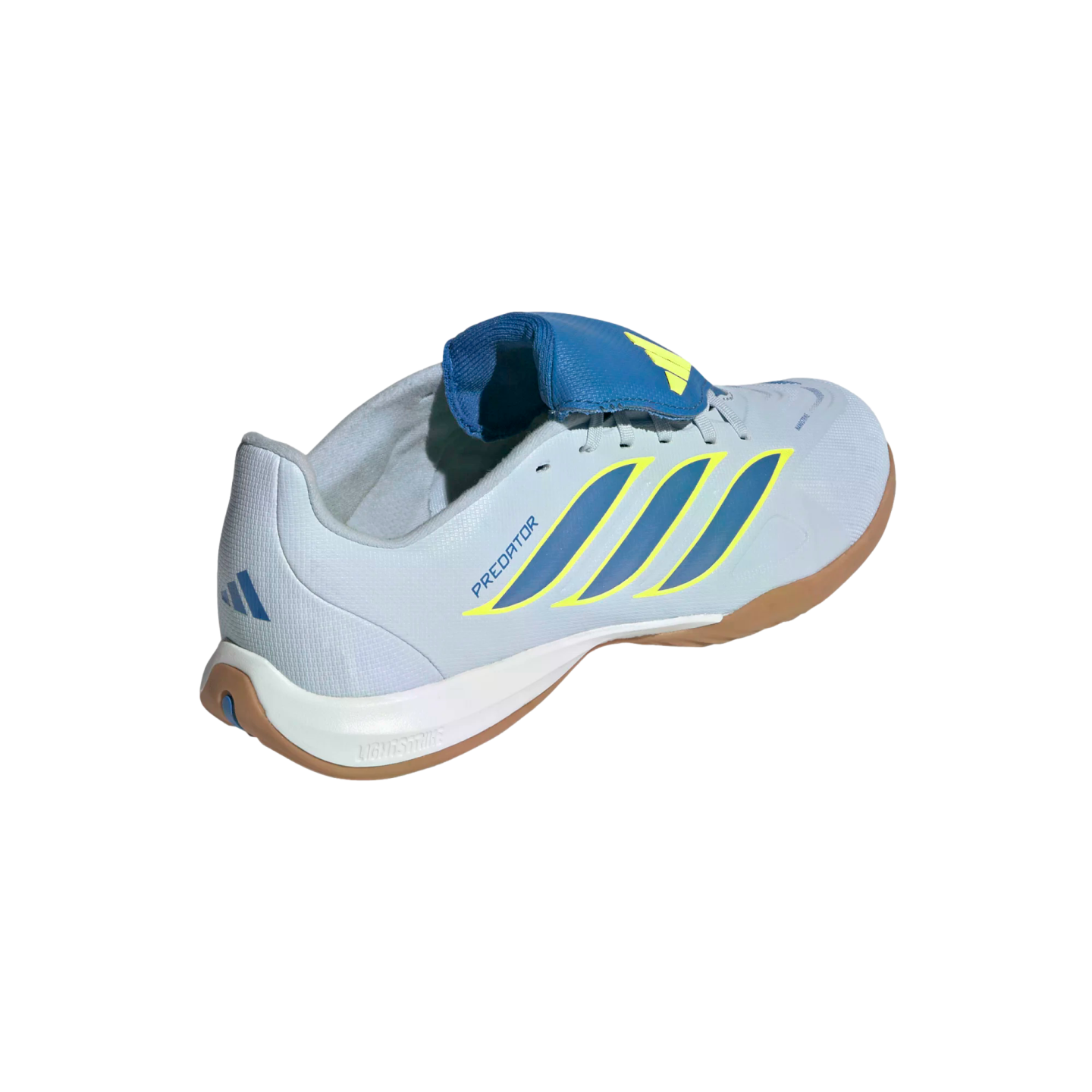 A rear three-quarter view of a light blue Adidas Predator indoor soccer shoe against a black background. The shoe features three diagonal dark blue stripes outlined in yellow on the side and the word "PREDATOR" in blue. It has a prominent blue fold-over t