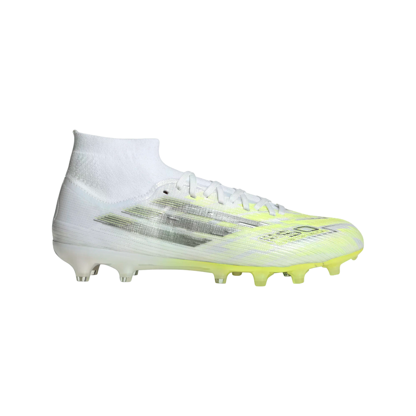 A white high-top soccer cleat with silver side stripes and neon yellow accents on the toe and sole, set against a black background.