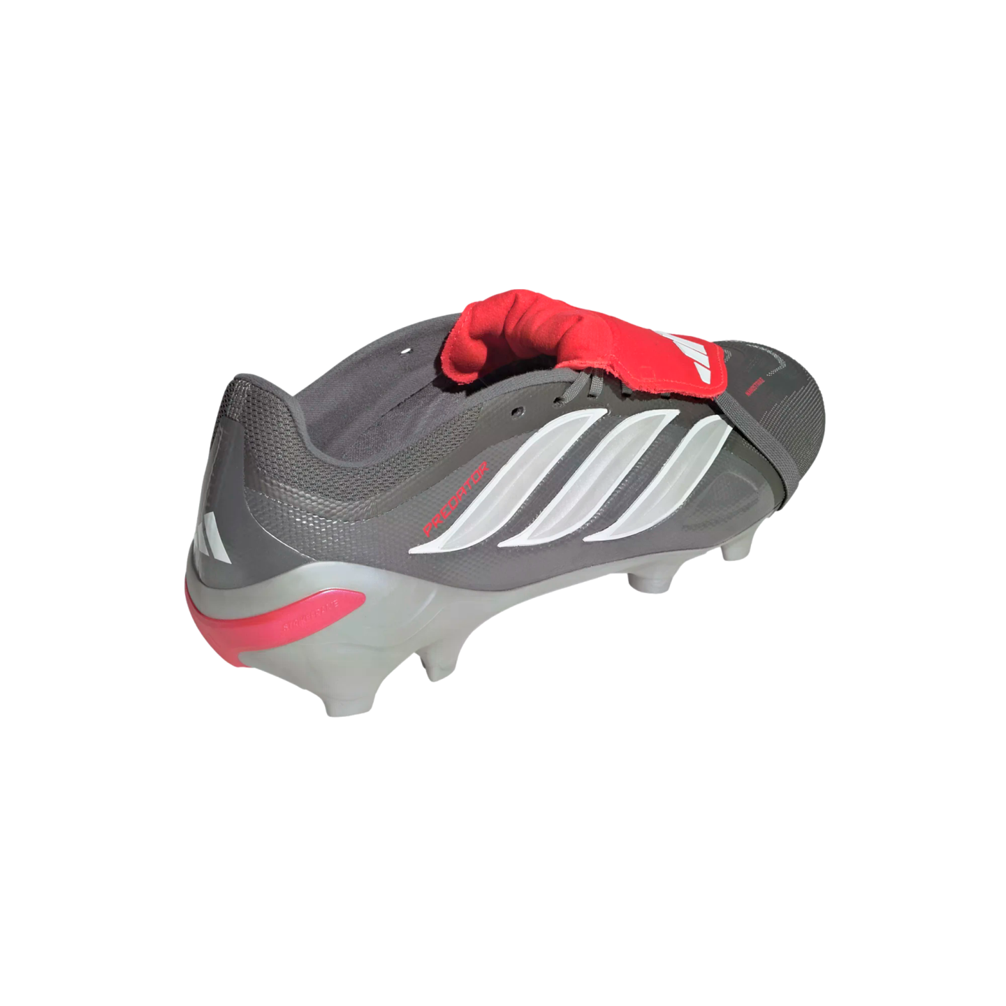 Grey Adidas Predator soccer cleat with white stripes and a red fold-over tongue on a black background.