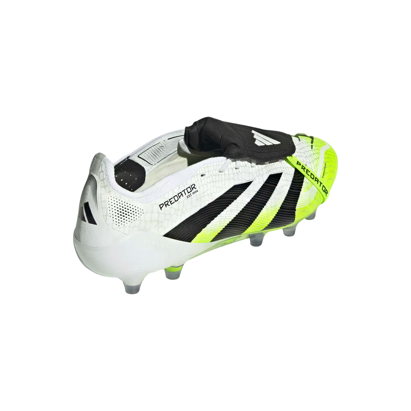 Side view of an Adidas Predator soccer cleat in white, black, and neon yellow, featuring a classic fold-over tongue and clear studs.