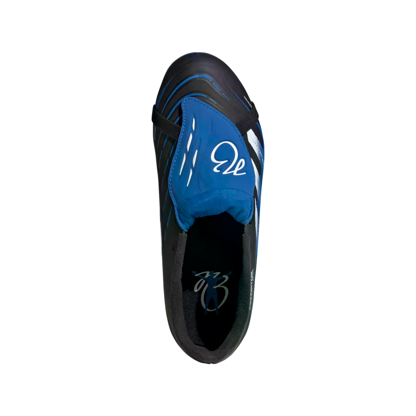 Top-down view of a black and blue soccer cleat with a blue fold-over tongue and white signature logo, set against a solid black background.
