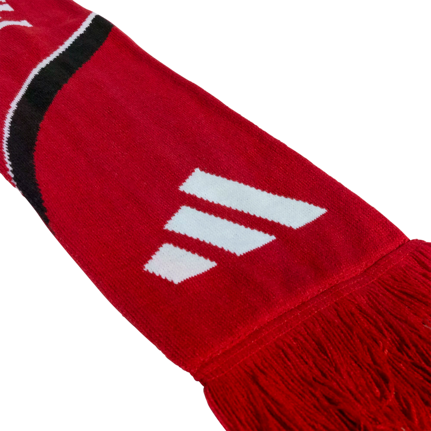 A red knitted scarf featuring a white three-stripe logo, a black and white curved stripe, and red tassels at the end.