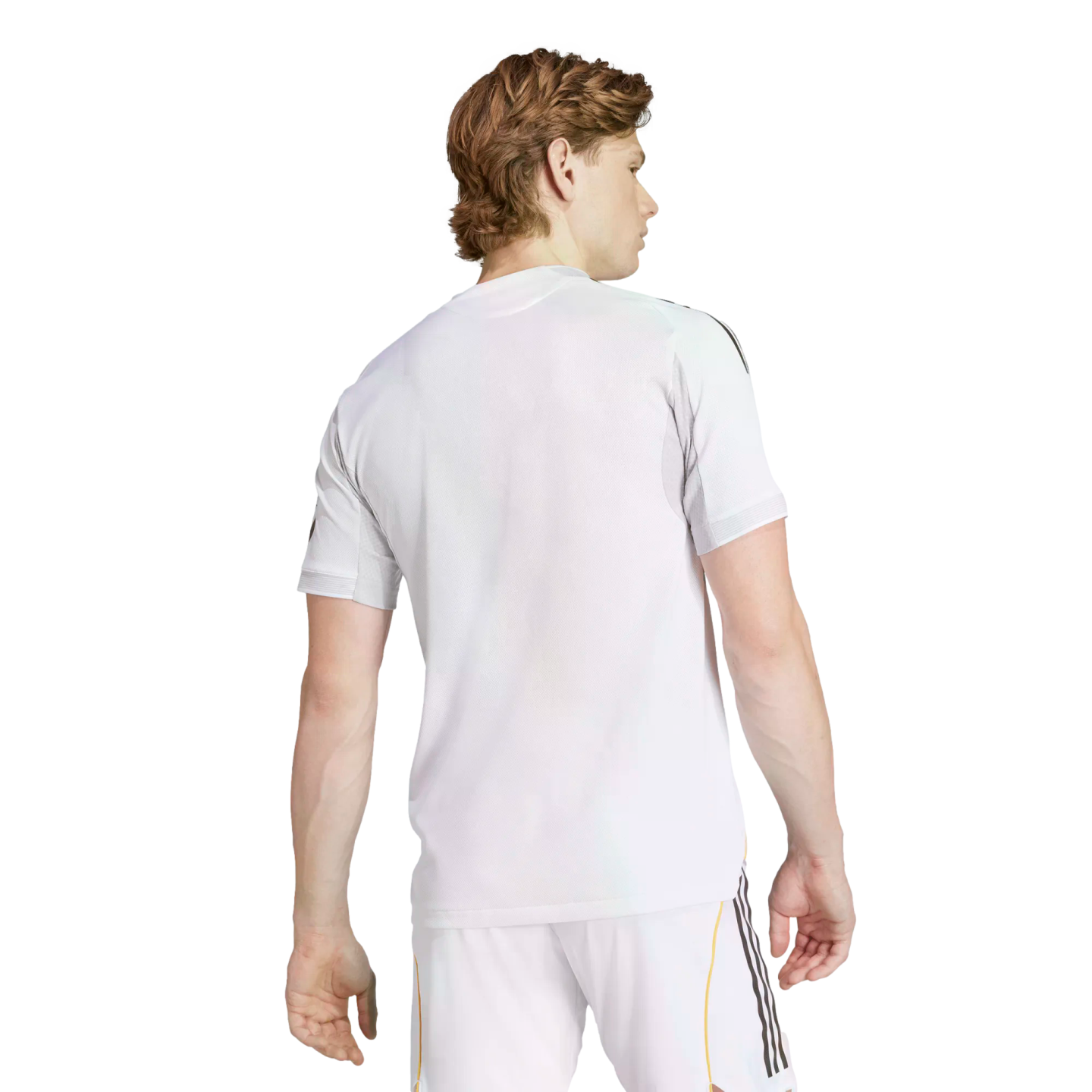 Rear view of a man with light brown hair wearing a white athletic t-shirt and white shorts with black stripes, isolated on a white background.