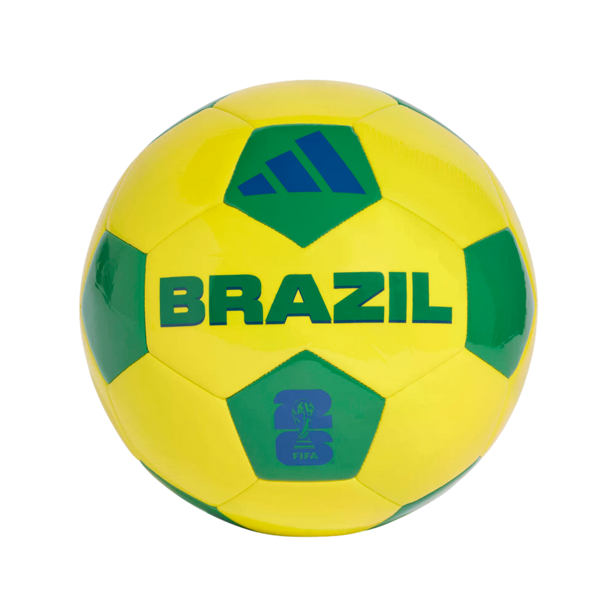 A yellow and green soccer ball is centered against a solid black background. The ball features the word "BRAZIL" in large green capital letters across its middle. Above the text is a blue Adidas logo on a green panel, and below it is a blue FIFA World Cup