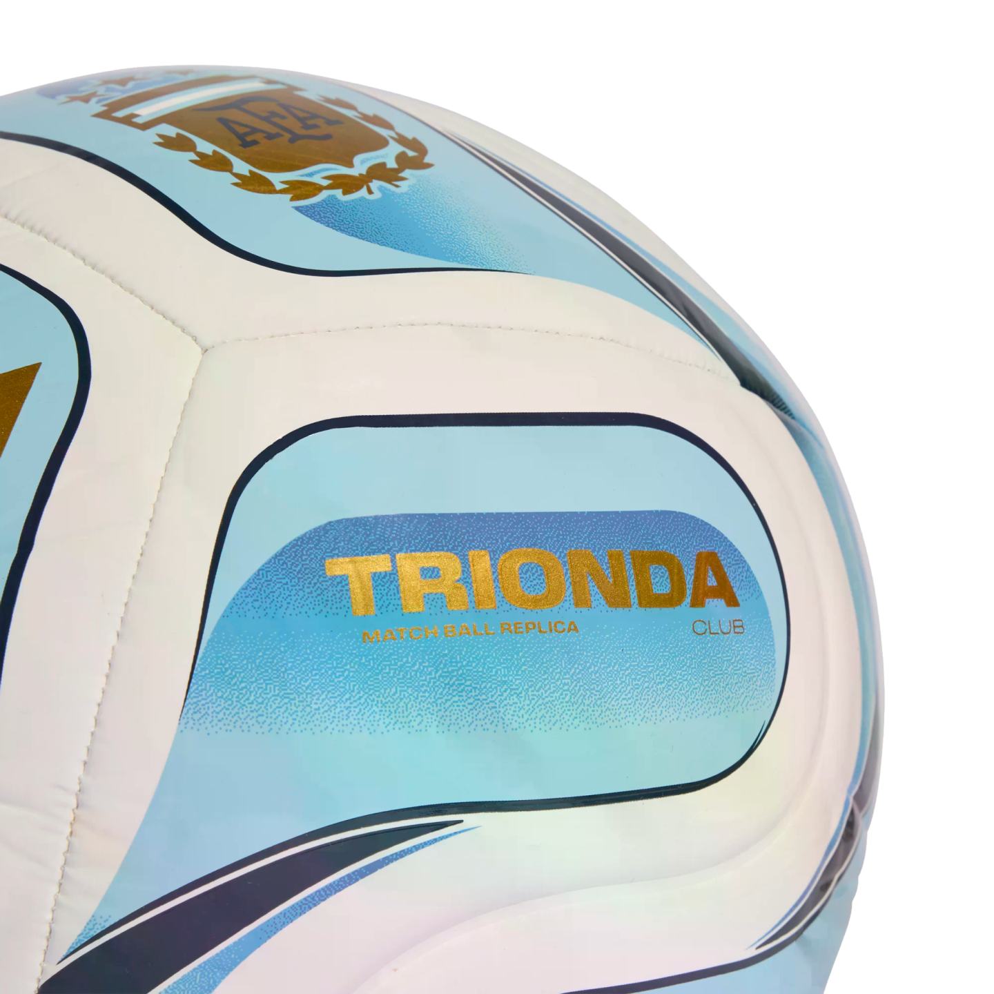 Close-up of a light blue and white soccer ball featuring the Argentine Football Association (AFA) crest and gold "TRIONDA" text.