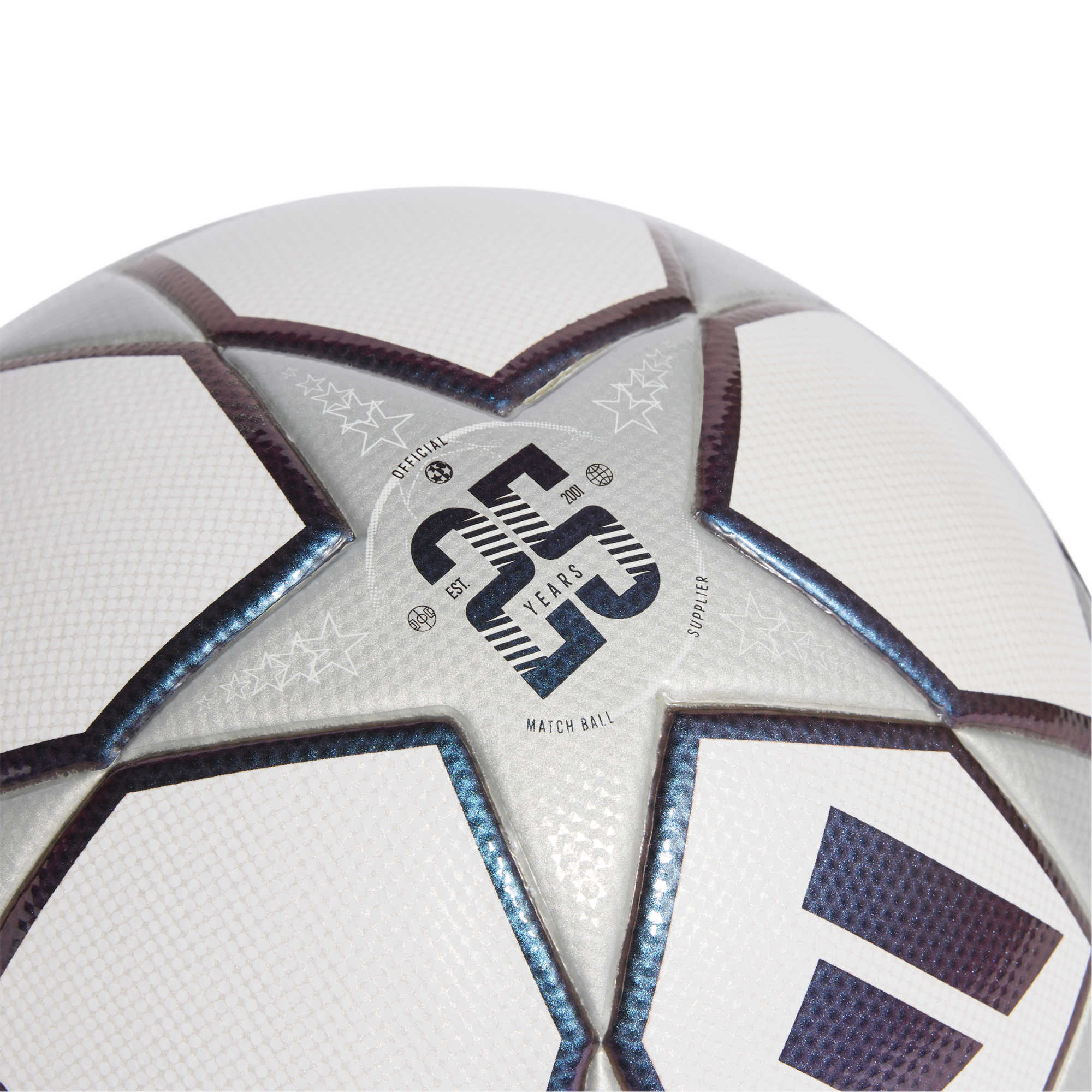 Close-up of a white and silver soccer ball with iridescent star panels. A central logo celebrates 23 years as the official match ball supplier since 2001.
