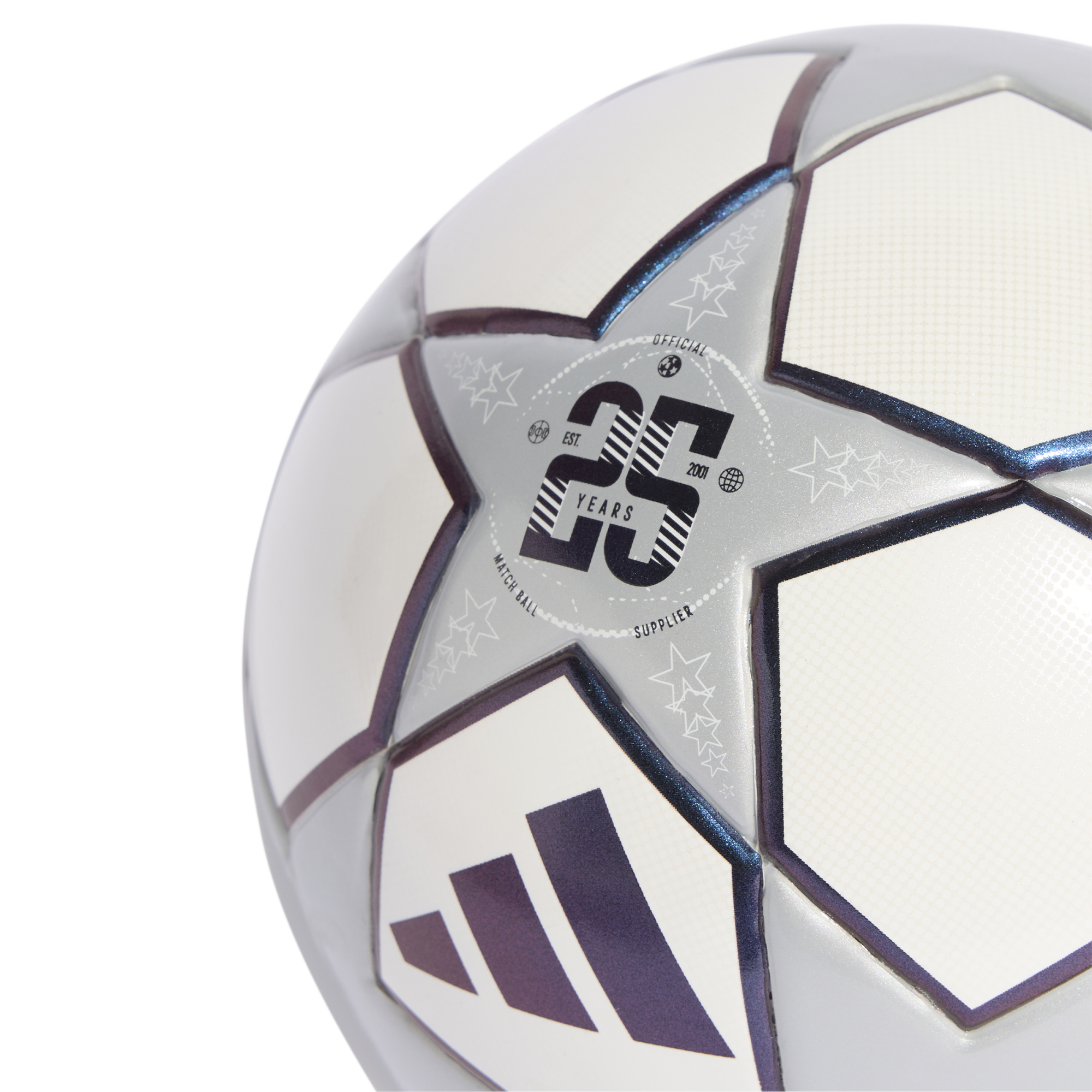 Close-up of an Adidas UEFA Champions League soccer ball with a "25 YEARS" anniversary star panel and iridescent details on a black background.
