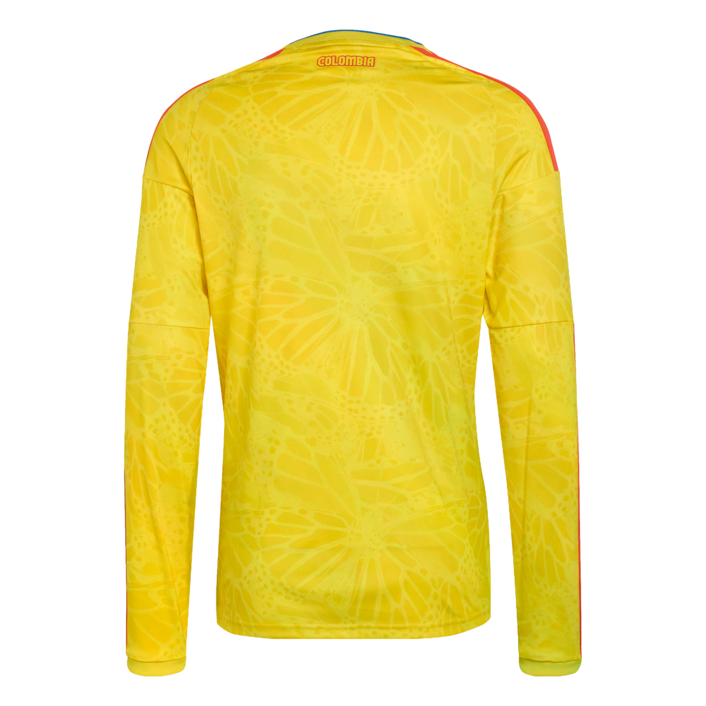 Back view of a yellow long-sleeved soccer jersey with a tonal butterfly pattern, orange stripes, and "COLOMBIA" printed on the upper back.