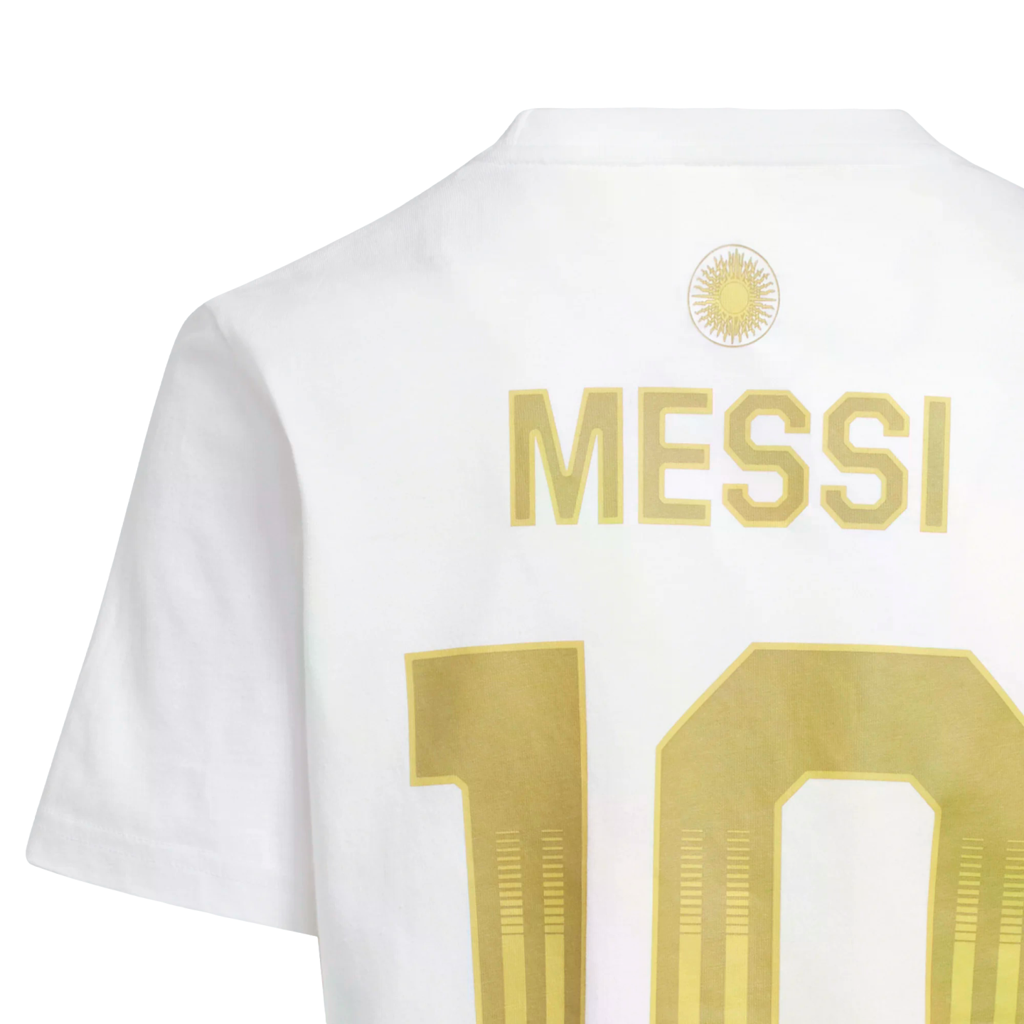 Back of a white jersey showing "MESSI" and the number "10" in gold lettering, with a gold sun emblem above the name.