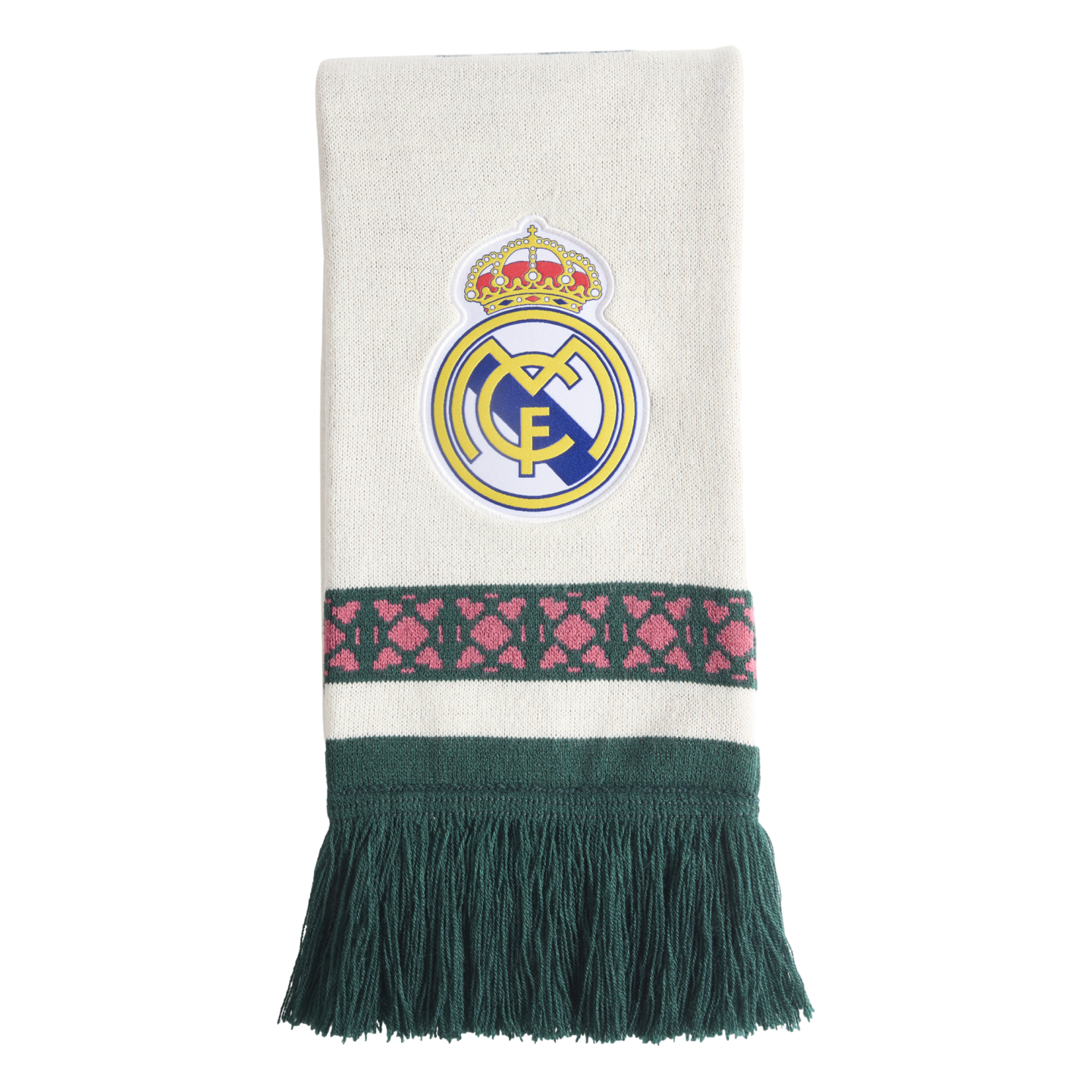 White knit scarf featuring a centered Real Madrid crest, a green horizontal band with pink geometric patterns, and long dark green fringe.