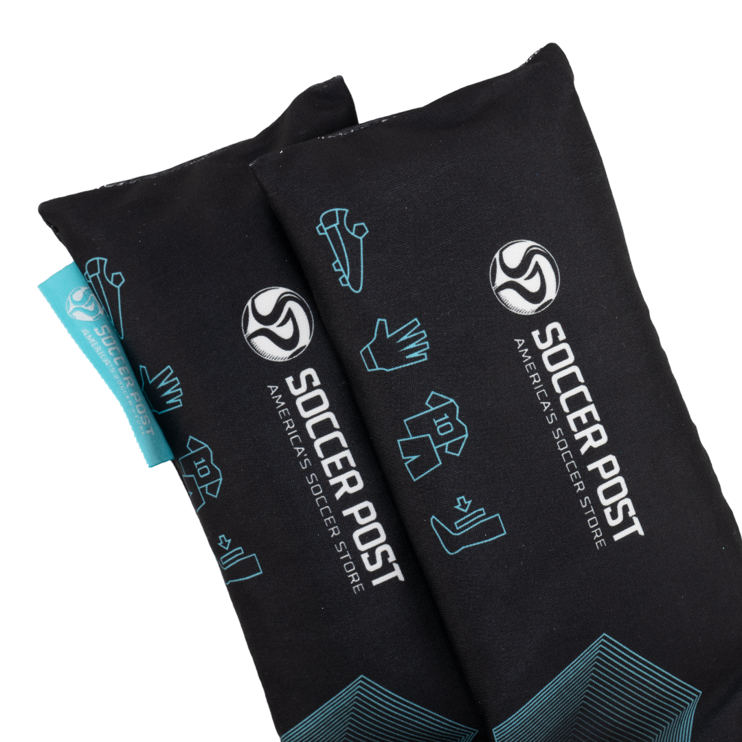 Two black Soccer Post Freshener Inserts featuring white "SOCCER POST" branding and blue graphic icons of soccer equipment including a cleat, goalie glove, jersey, and shin guard.