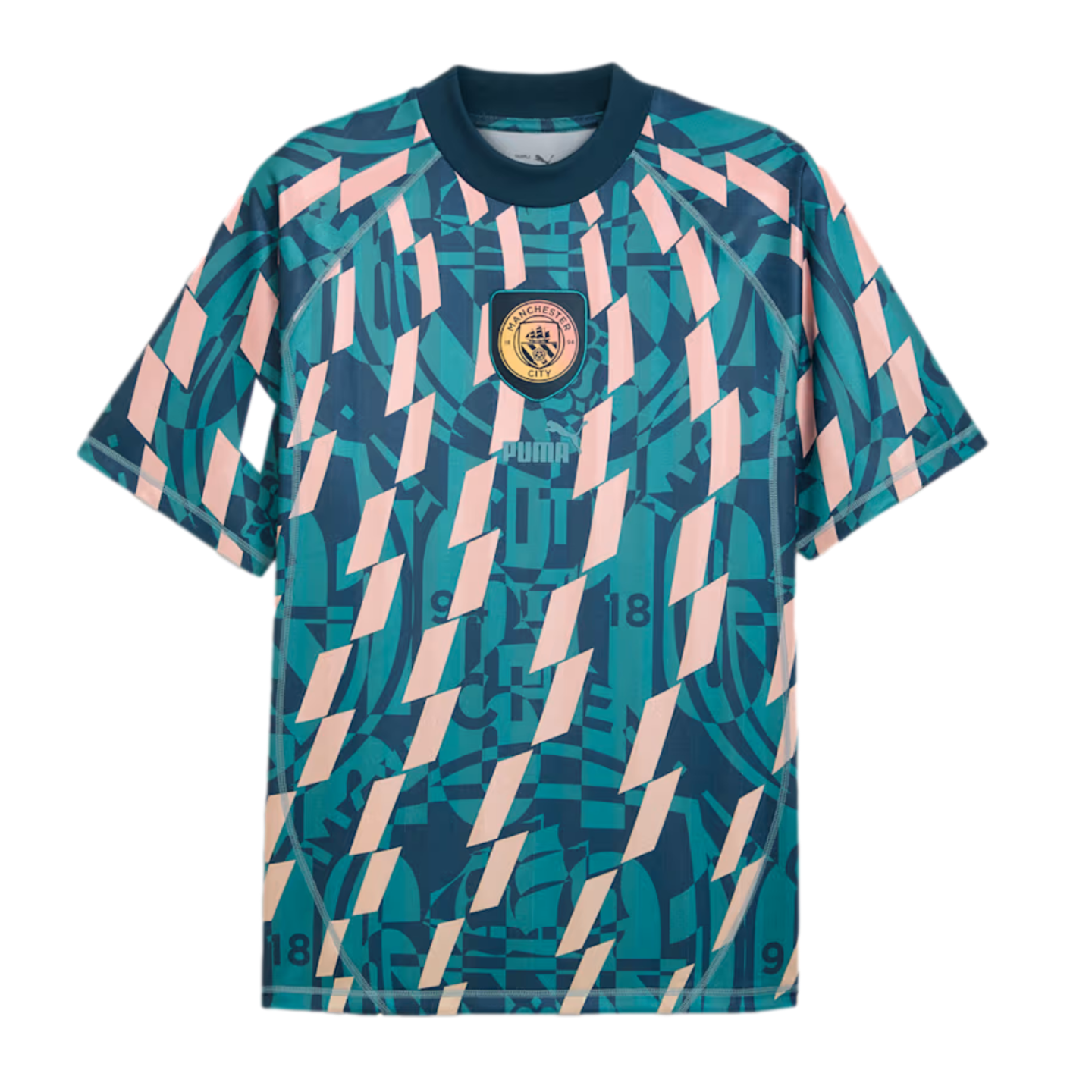 Manchester City pre-match jersey with a teal and pink abstract geometric pattern. Centered club crest and Puma logo.