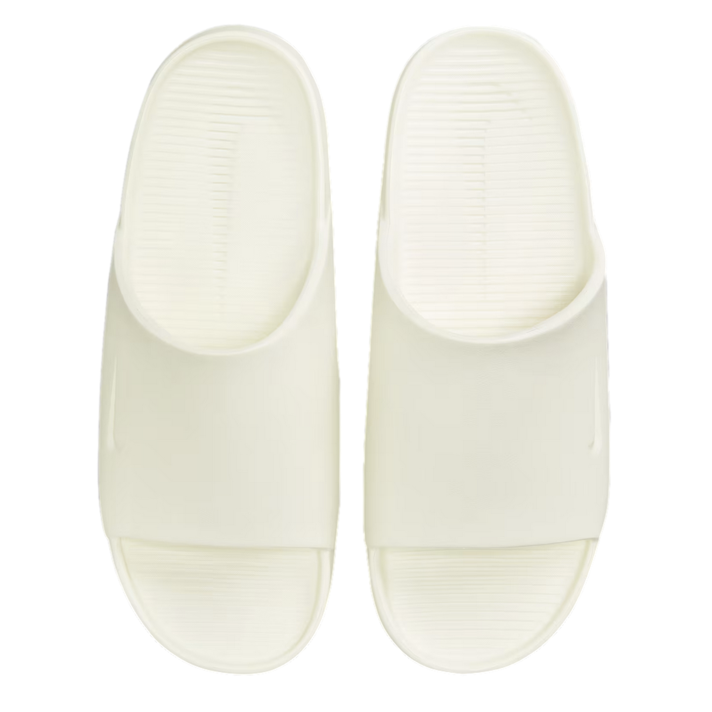 Overhead view of a pair of off-white minimalist slide sandals, featuring a wide strap and textured footbed.