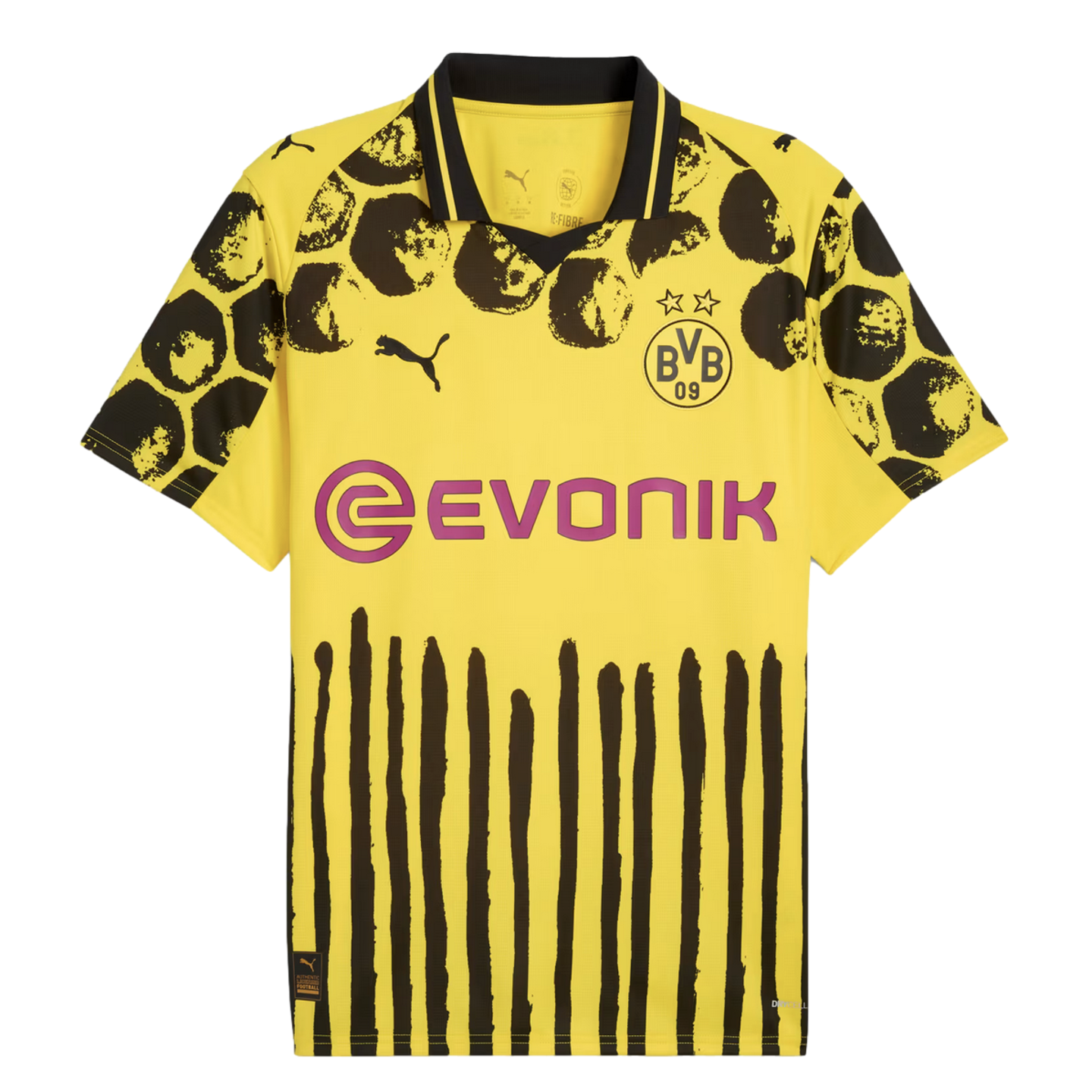 Yellow Puma Borussia Dortmund jersey with black circular shoulder graphics, vertical brush-stroke stripes on the lower half, and a purple "Evonik" sponsor logo.