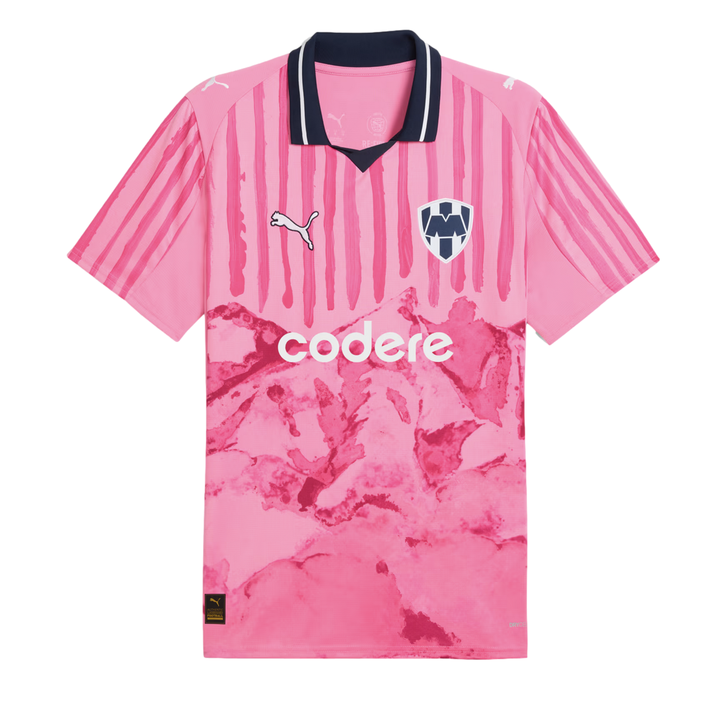 Pink Monterrey soccer jersey with a navy collar, vertical stripes on the top half, and a mountain graphic on the lower half. Features Puma and Codere logos.