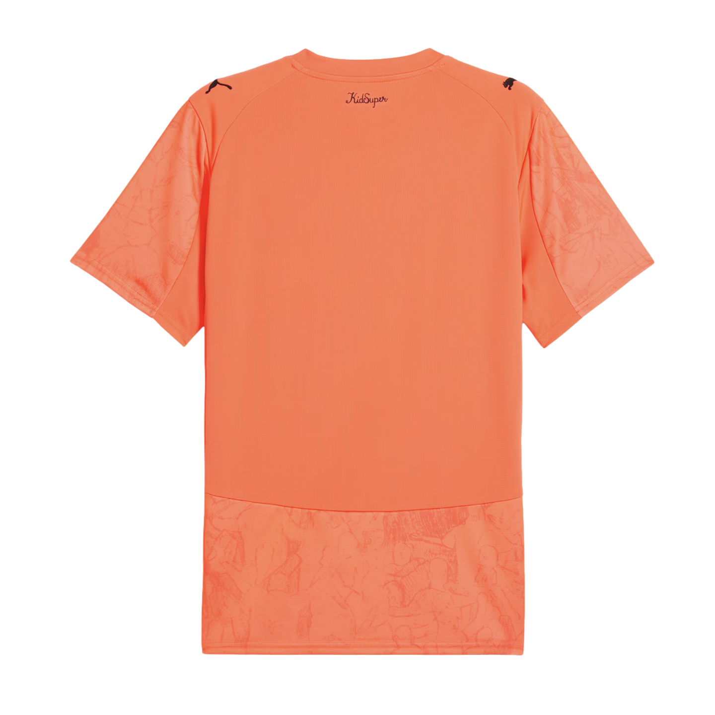 Back view of a short-sleeved orange jersey with "KidSuper" script at the neck, Puma logos on the shoulders, and tonal graphic illustrations on the sleeves and bottom hem.