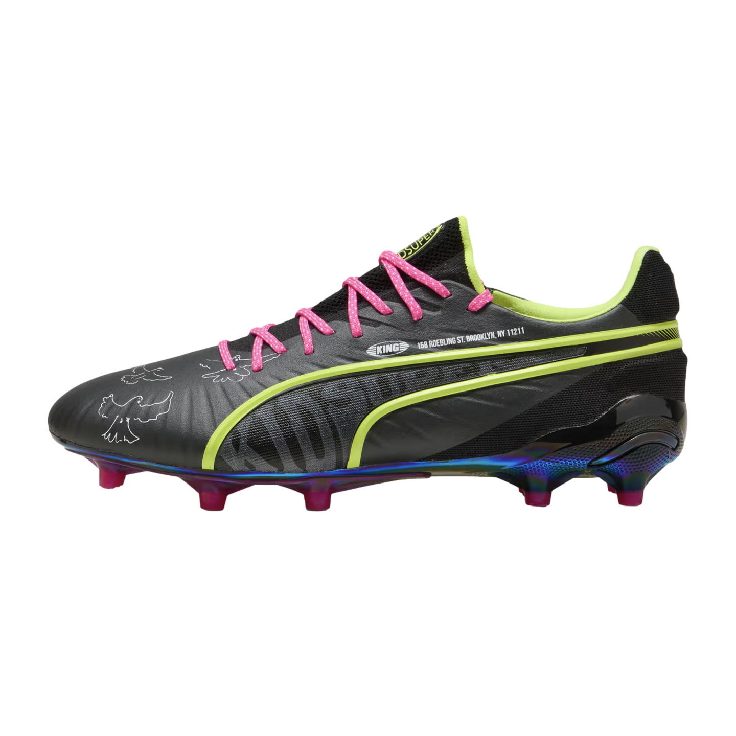 Profile view of a black Puma King soccer cleat with neon yellow accents, pink laces, white pigeon graphics on the toe, and an iridescent sole plate with pink studs.