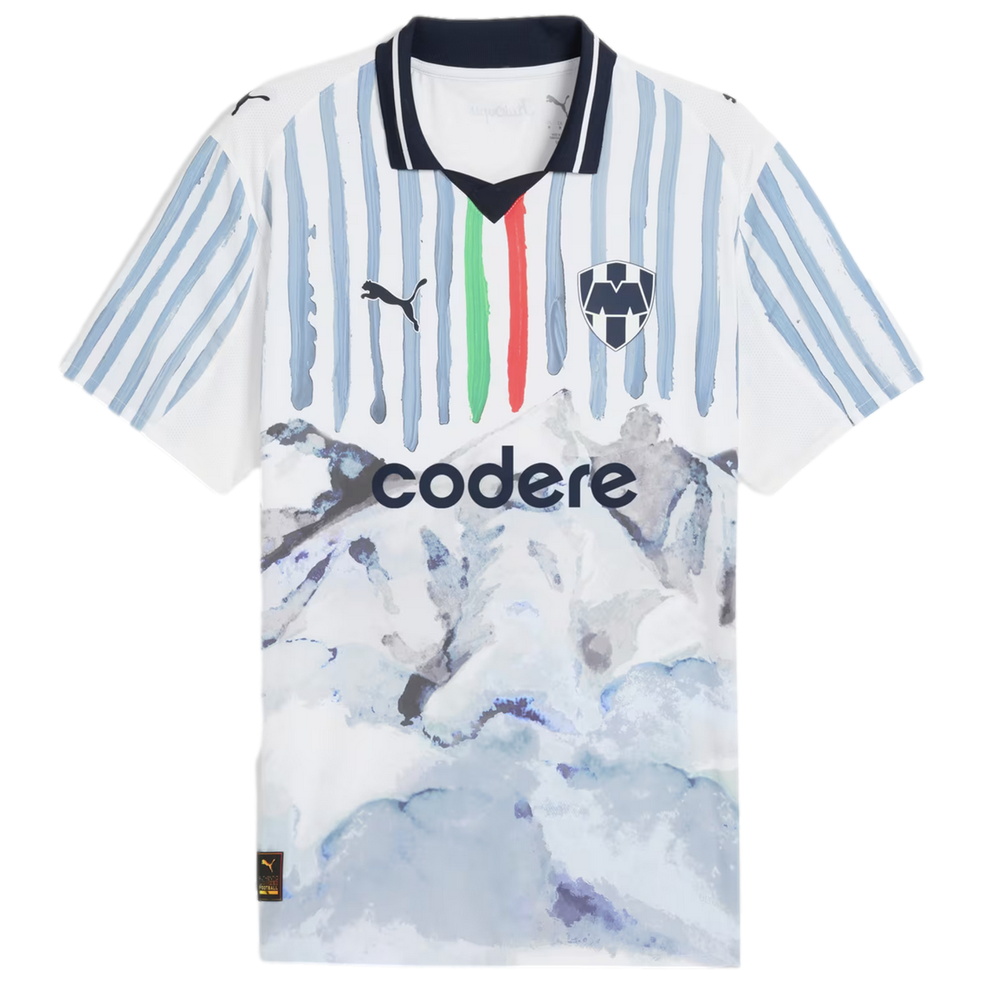 White Puma soccer jersey for CF Monterrey featuring blue brushstroke stripes, a watercolor mountain landscape graphic, and the "codere" sponsor logo.