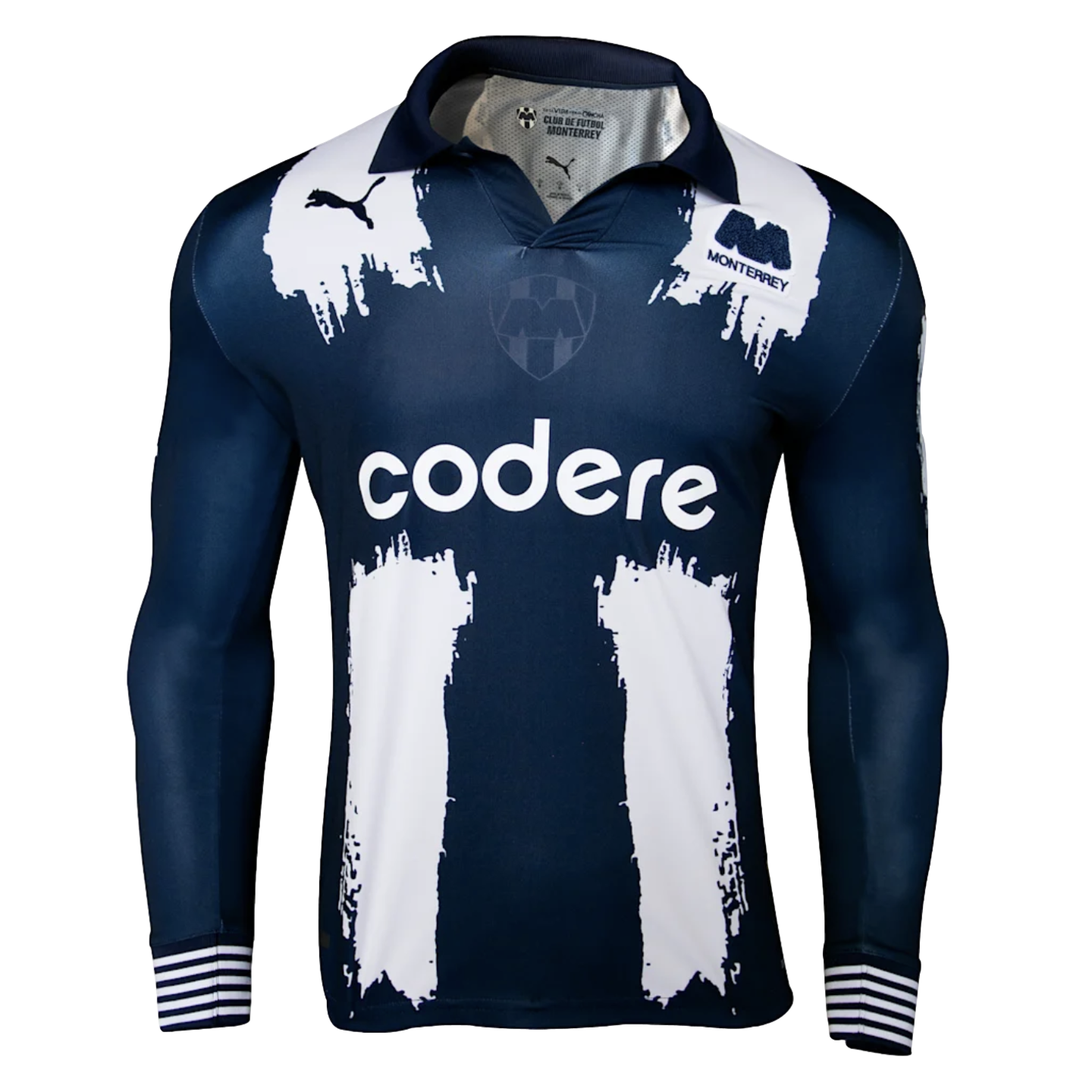 A navy blue long-sleeve Puma soccer jersey for Monterrey featuring white paint-stroke graphics and the "codere" sponsor logo.