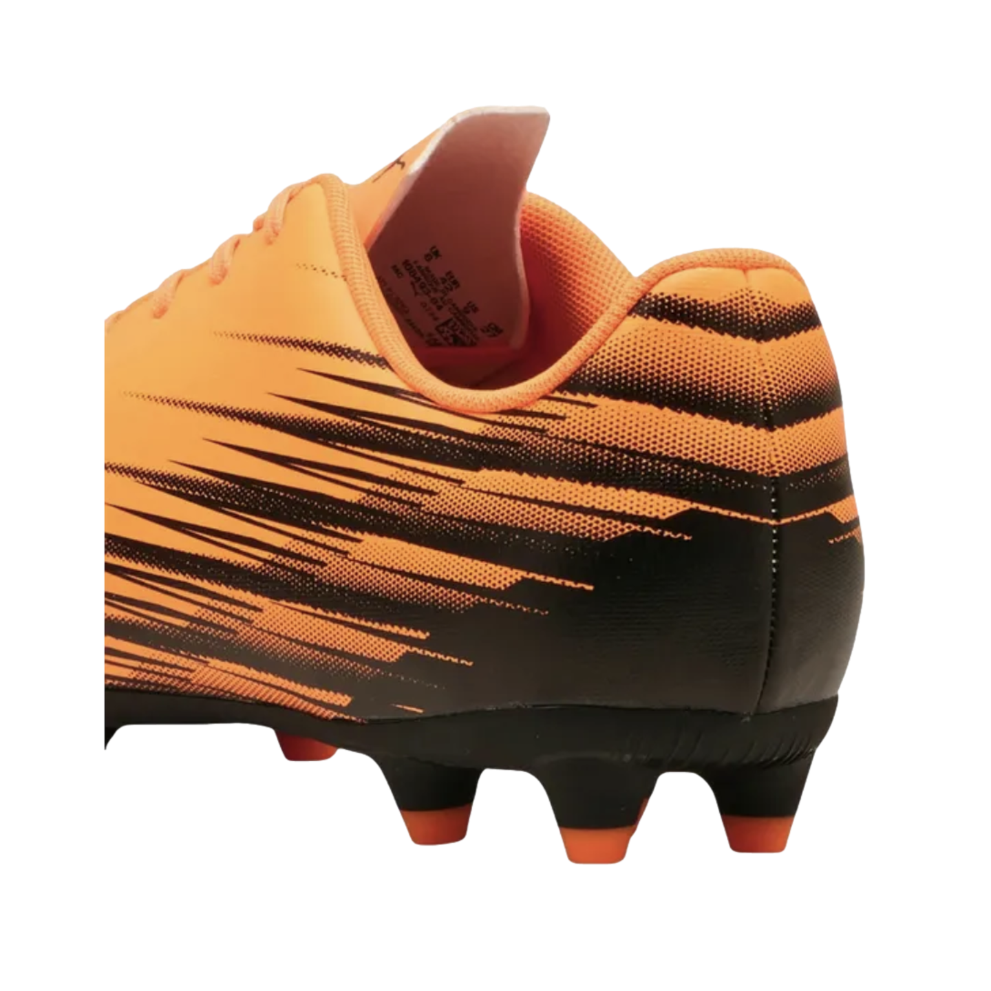 Rear-view of an orange and black soccer cleat with a graphic streak pattern and orange-tipped studs, set against a black background.