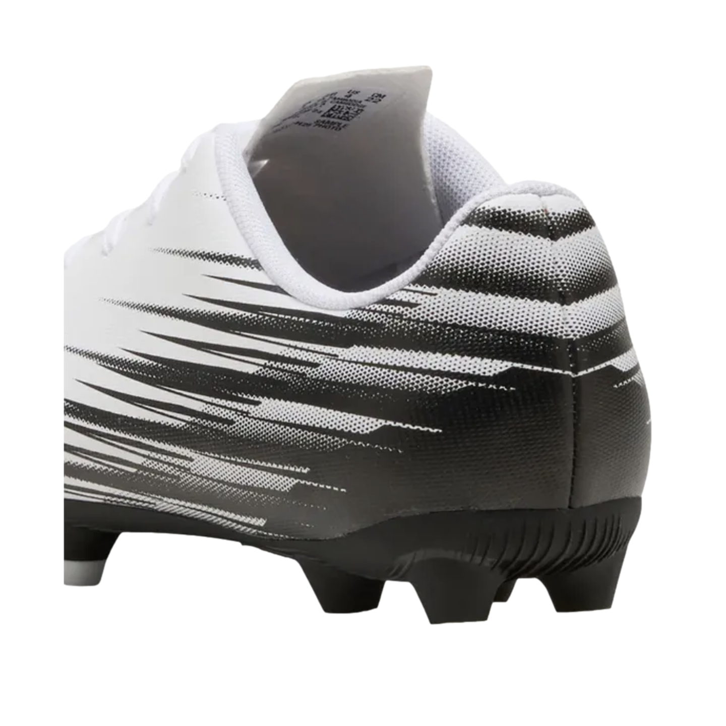 Rear view of a white soccer cleat with black graphic streaks on the side and heel, featuring black studs against a black background.