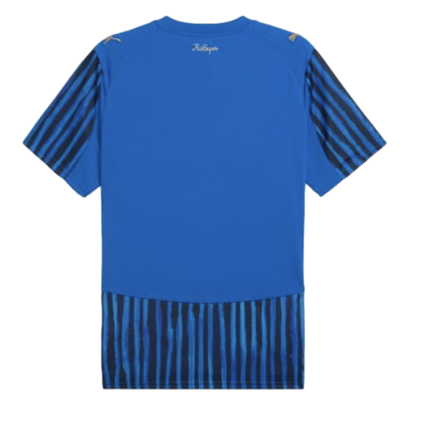 Rear view of a blue Puma soccer jersey with black-striped sleeves and a textured striped hem. Features a small 'KidSuper' logo below the back neckline.