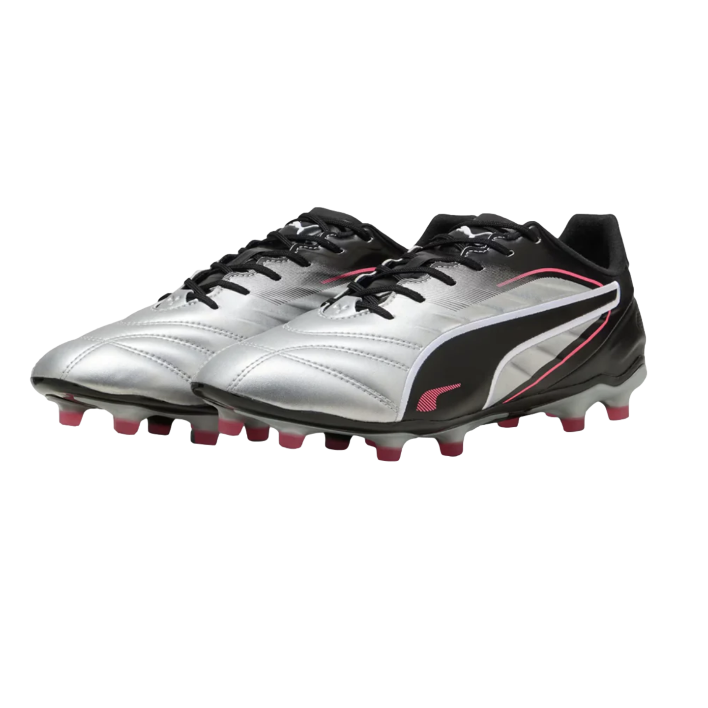A pair of silver and black Puma soccer cleats with pink accents and studs, displayed against a solid black background.
