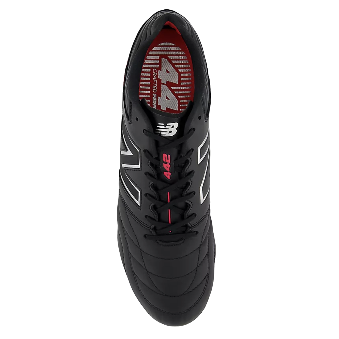 A top-down view of a black New Balance 442 soccer cleat with white logos and red accents on the tongue and insole, isolated on a solid black background.