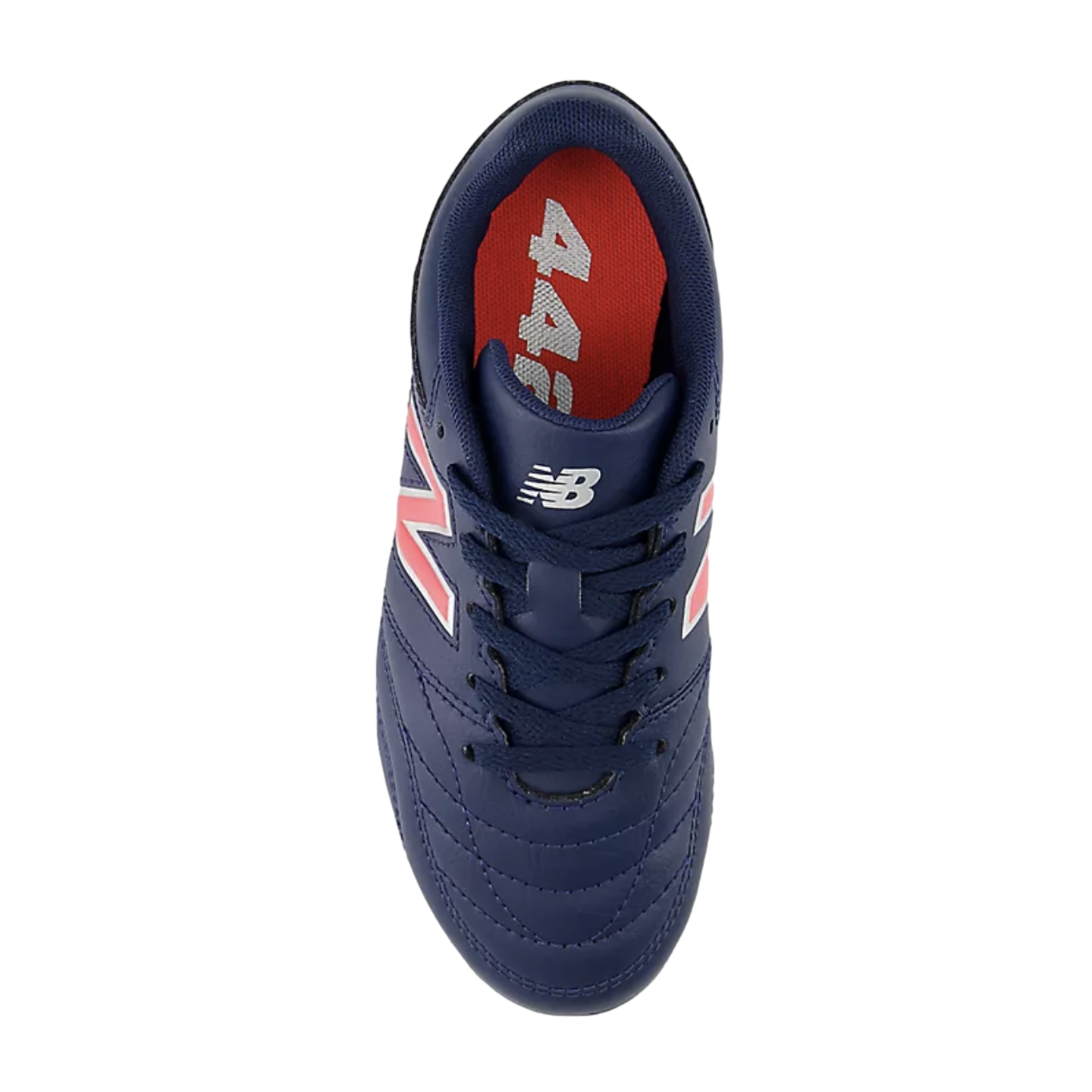 Top-down view of a navy blue New Balance 442 soccer cleat with pink accents and a bright red interior, set against a black background.