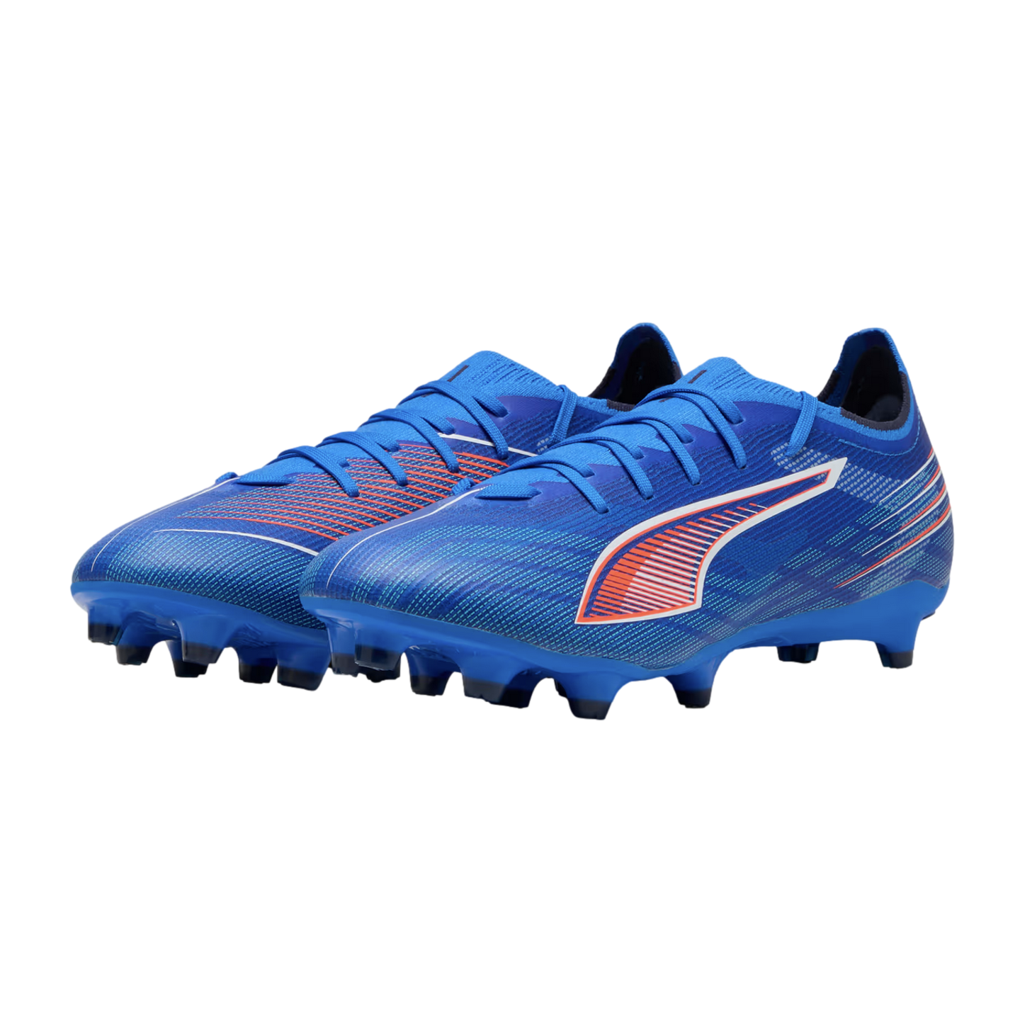 Pair of blue Puma soccer cleats with orange and white accents and molded studs on a black background.