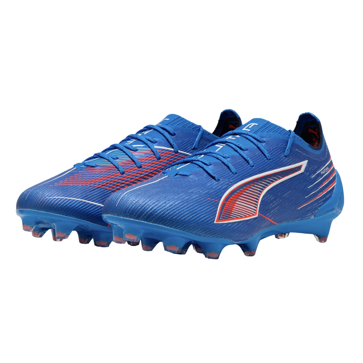 A pair of blue Puma soccer cleats with white and orange accents, a textured upper, and studded soles, displayed against a black background.