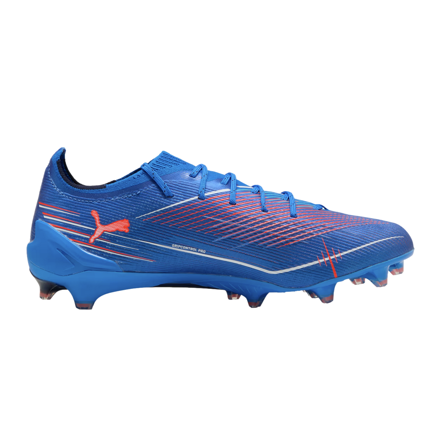 A side view of a royal blue Puma soccer cleat featuring red and white graphic accents, blue laces, and molded studs, set against a solid black background.